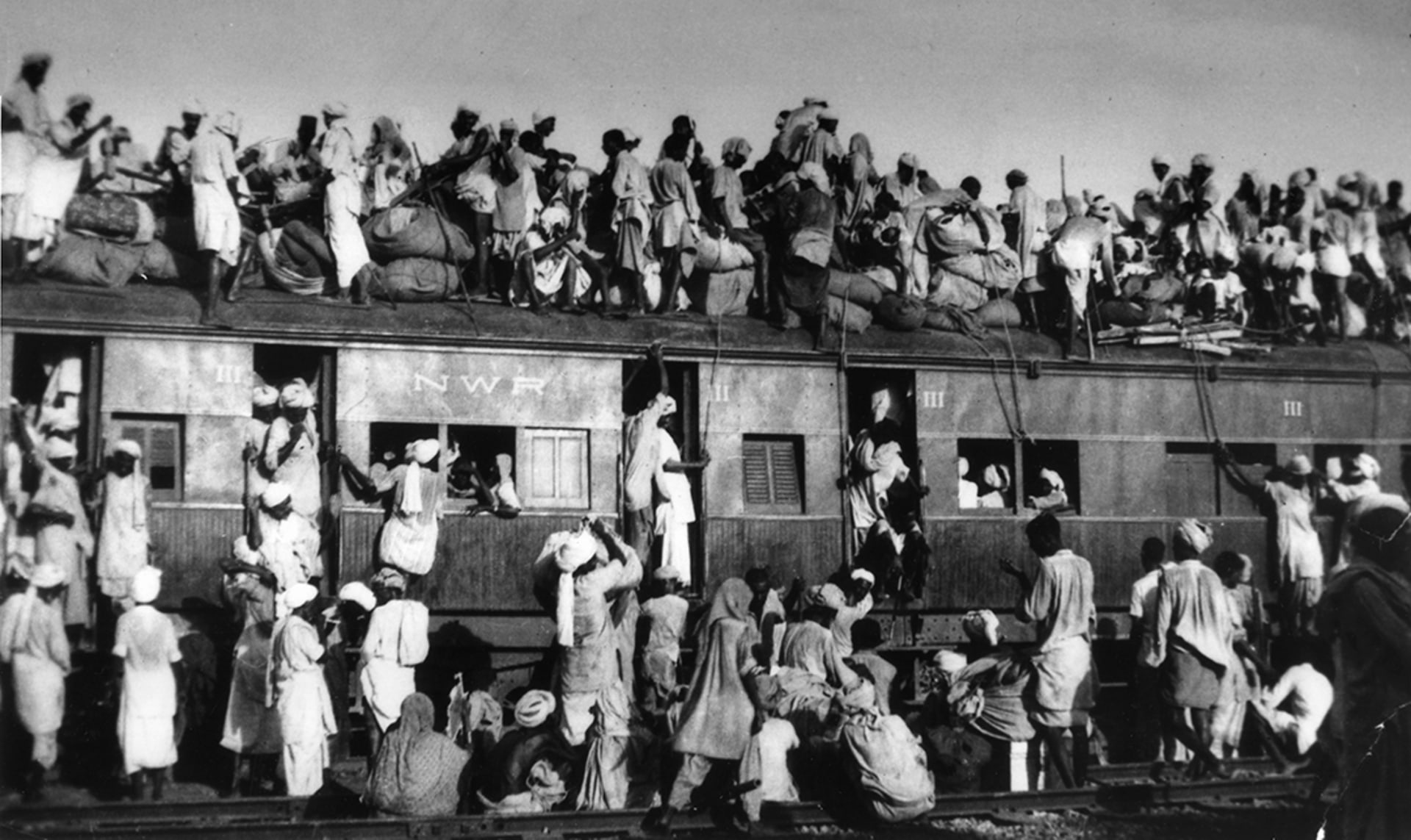 Muslim refugees attempt to flee India after partition in 1947. AP Photo