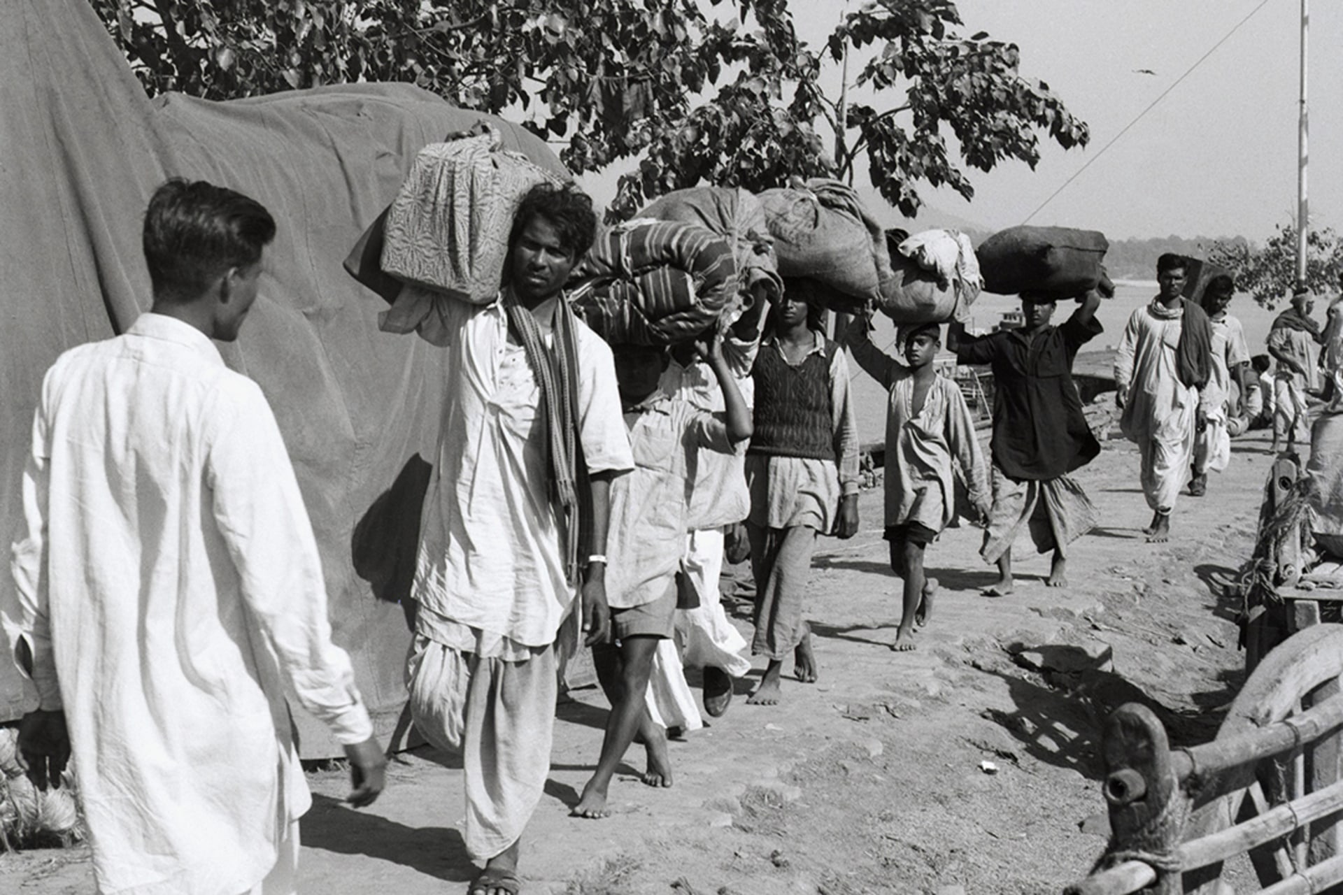 Refugees from Northeast India evacuate their homes after Chinese troops attack. AP Photo
