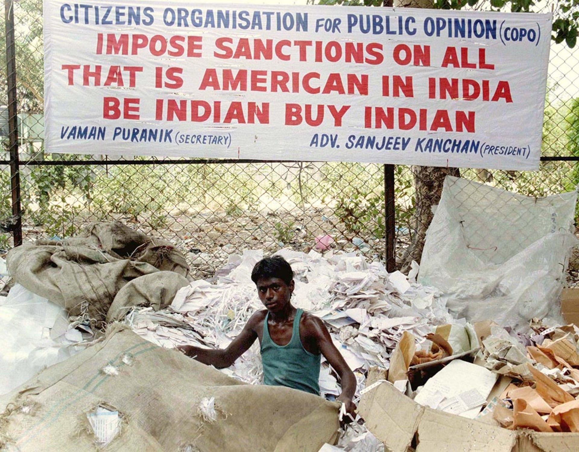 A banner encourages the boycott of U.S. goods after Washington imposes economic sanctions on India. Savita Kirloskar/Reuters