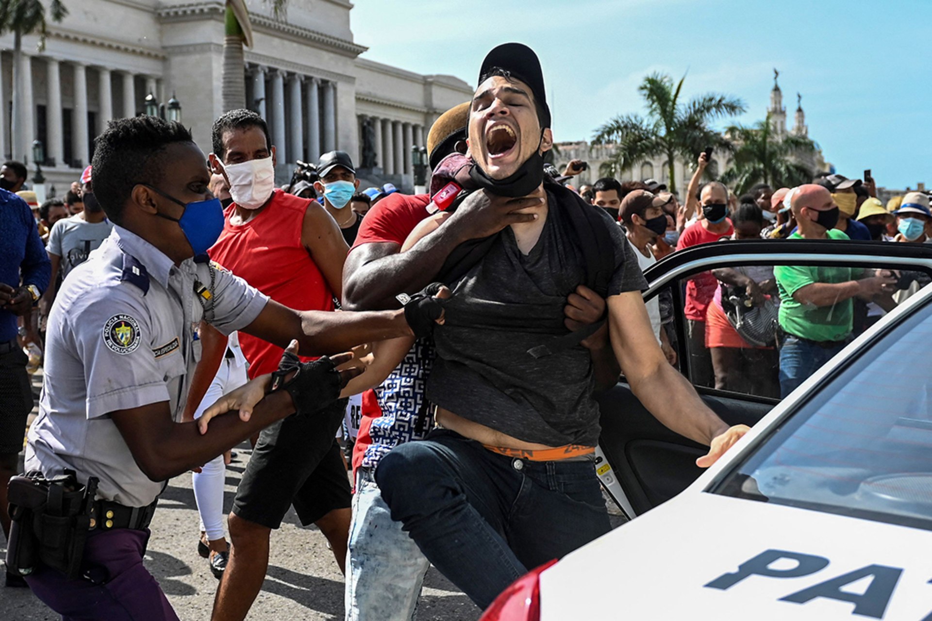 A man is arrested during anti-regime protests in Havana on July 11, 2021.