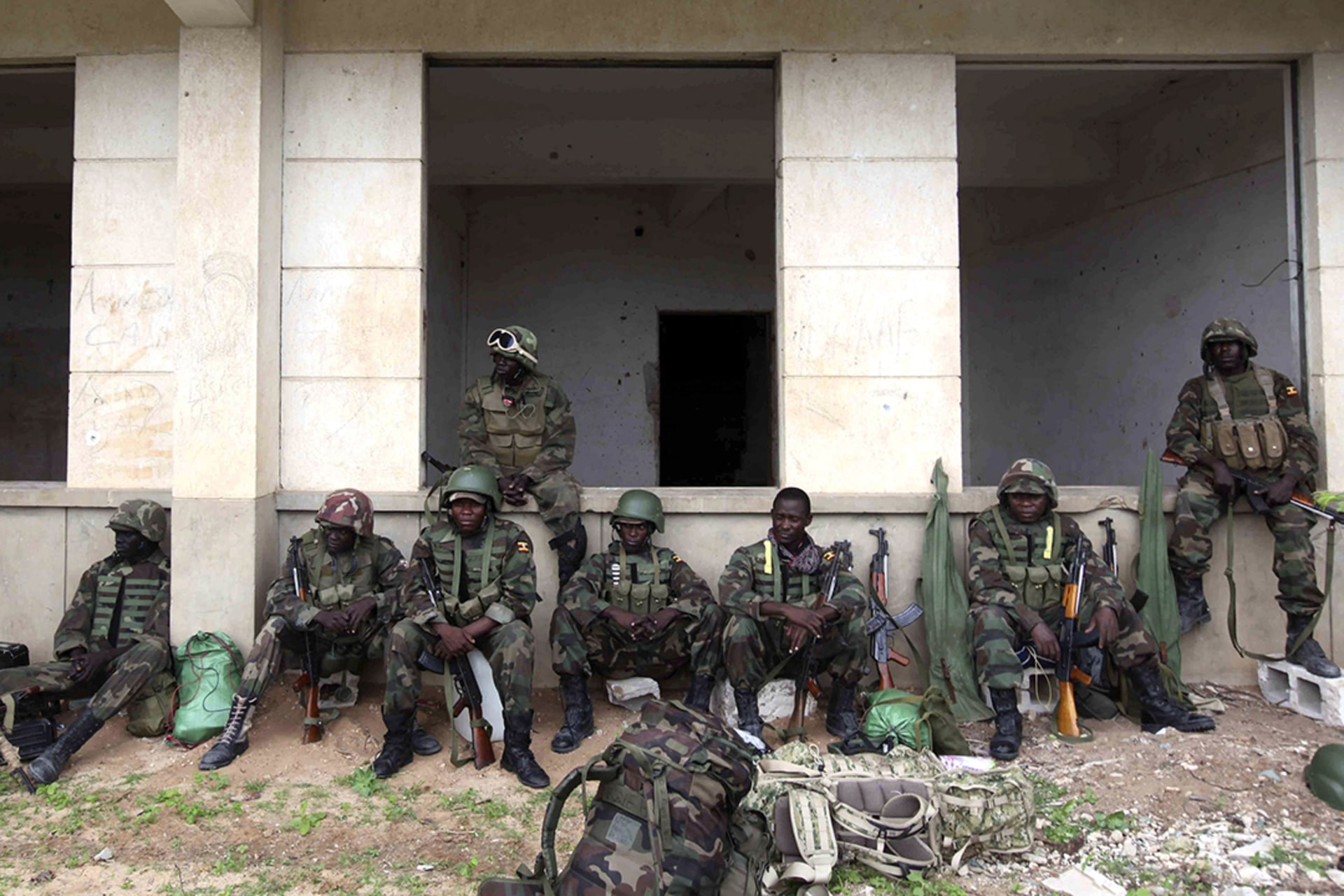 AMISOM forces sit outside Mogadishu Stadium. Feisal Omar/Reuters