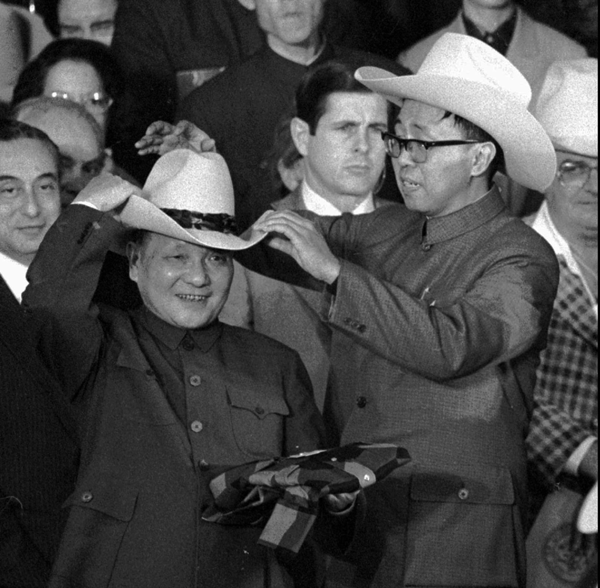 Chinese Vice Premier Deng Xiaoping enjoys a Texas rodeo. 
