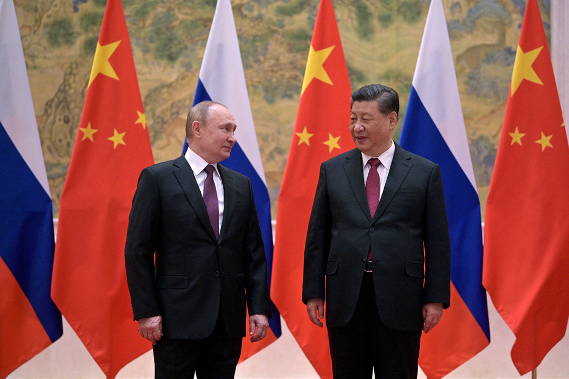 Russian President Vladimir Putin meets with Chinese President Xi Jinping in February 2022. 
