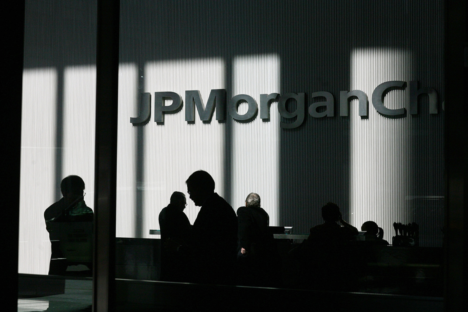 The Fed helps JPMorgan Chase buy Bear Stearns at rock bottom prices to shore up the financial sector.