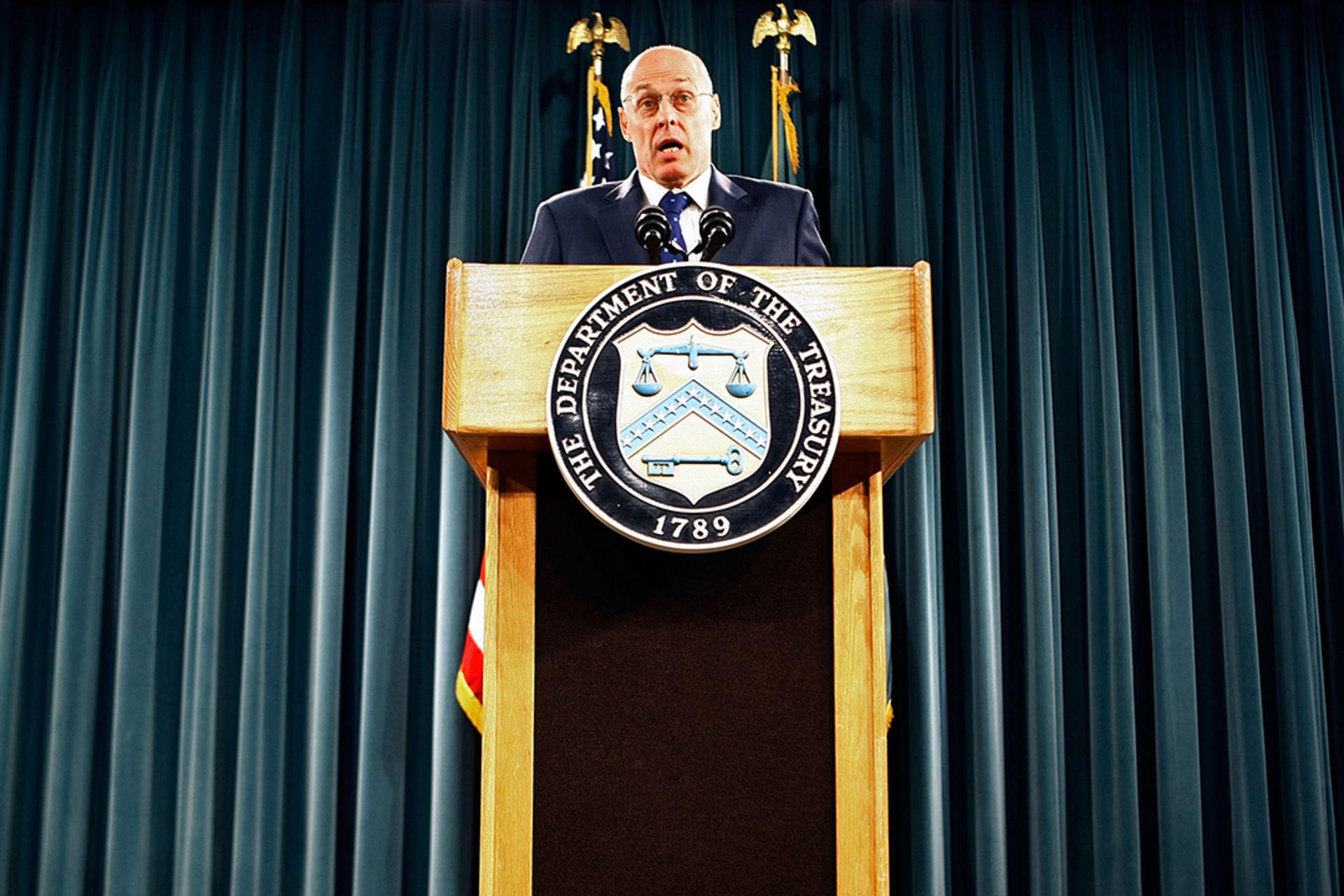 Treasury Secretary Henry Paulson announces his rescue plan at a September 19 news conference.