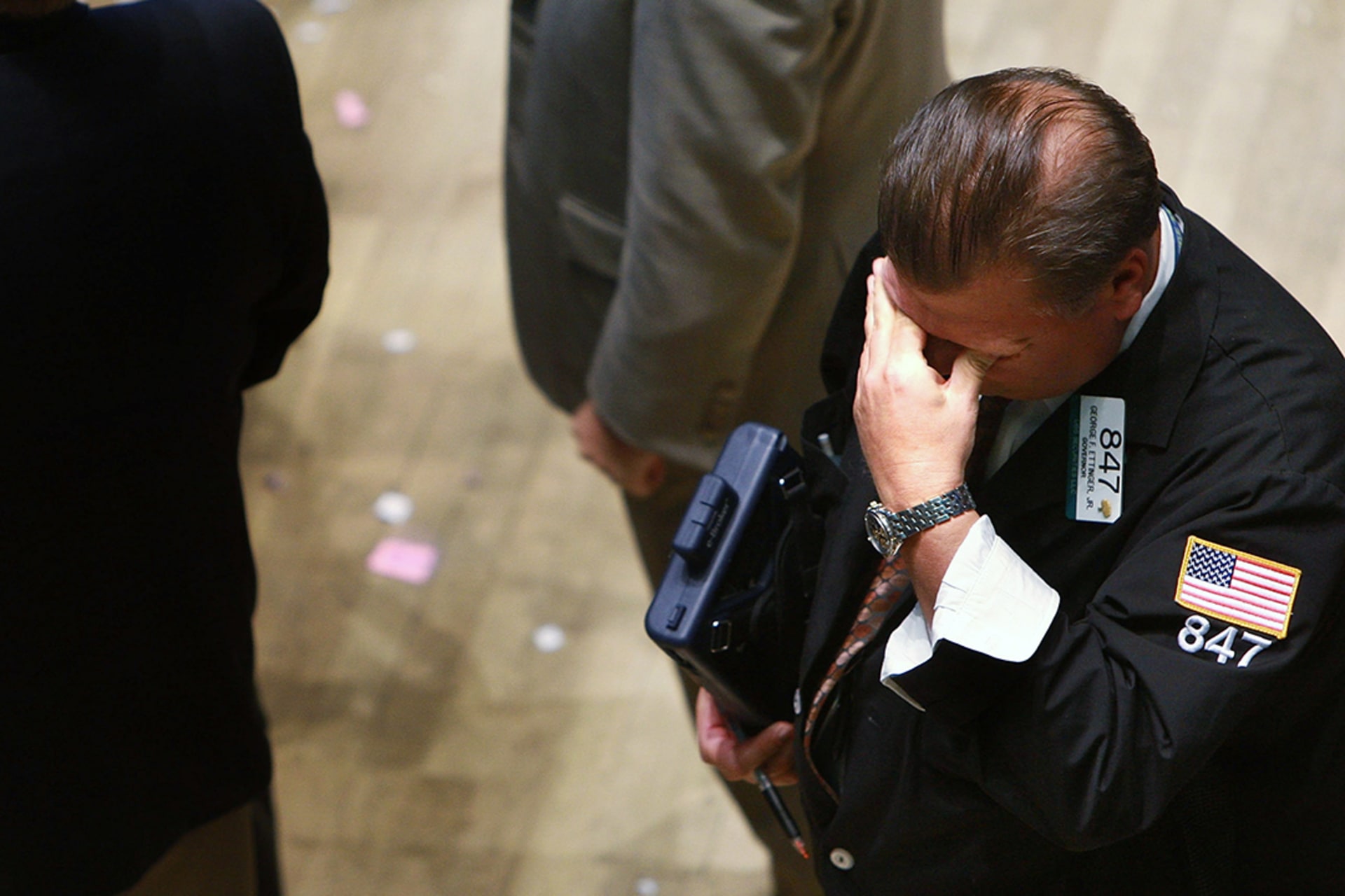 A trader reacts on the floor of the New York Stock Exchange as markets plummet in October 2008.