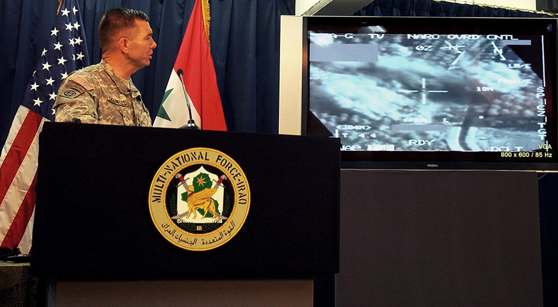 Major General Bill Caldwell presents satellite images of the U.S air strike that killed al-Qaeda leader Abu Musab al-Zarqawi.