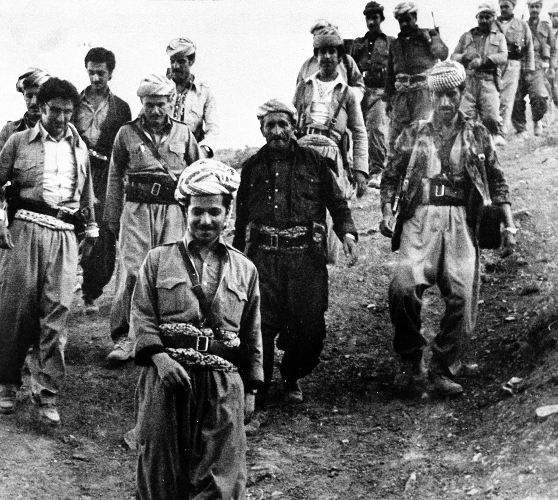 Mustafa Barzani and his son, Masoud Barzani, cross the Iranian border into Iraq in July 1979.