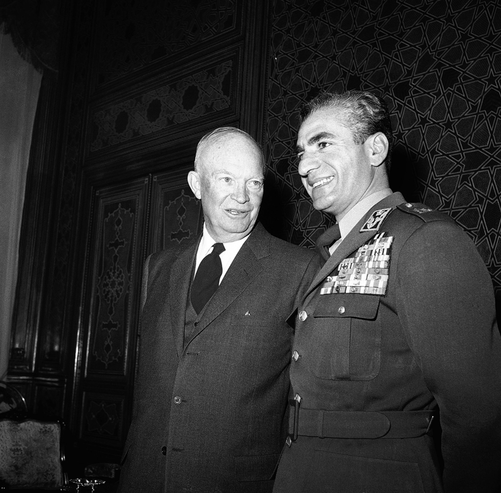 President Dwight D. Eisenhower and Shah Mohammad Reza Pahlavi of Iran pose at the Marble Palace in Tehran.
