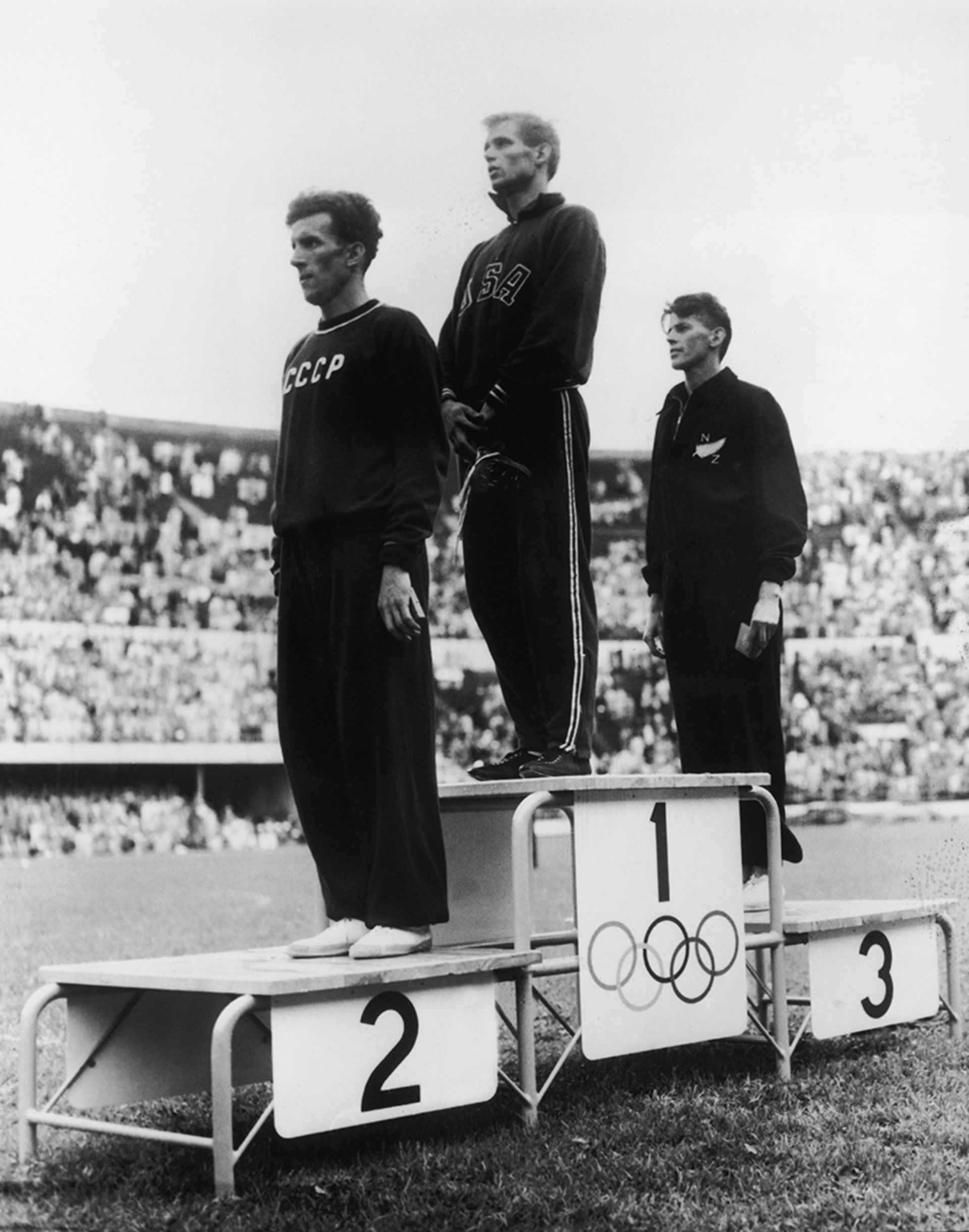 The Soviet Union’s Yuri Lituev (left) wins a silver medal in Helsinki, Finland. Keystone/Hulton Archive/Getty Images