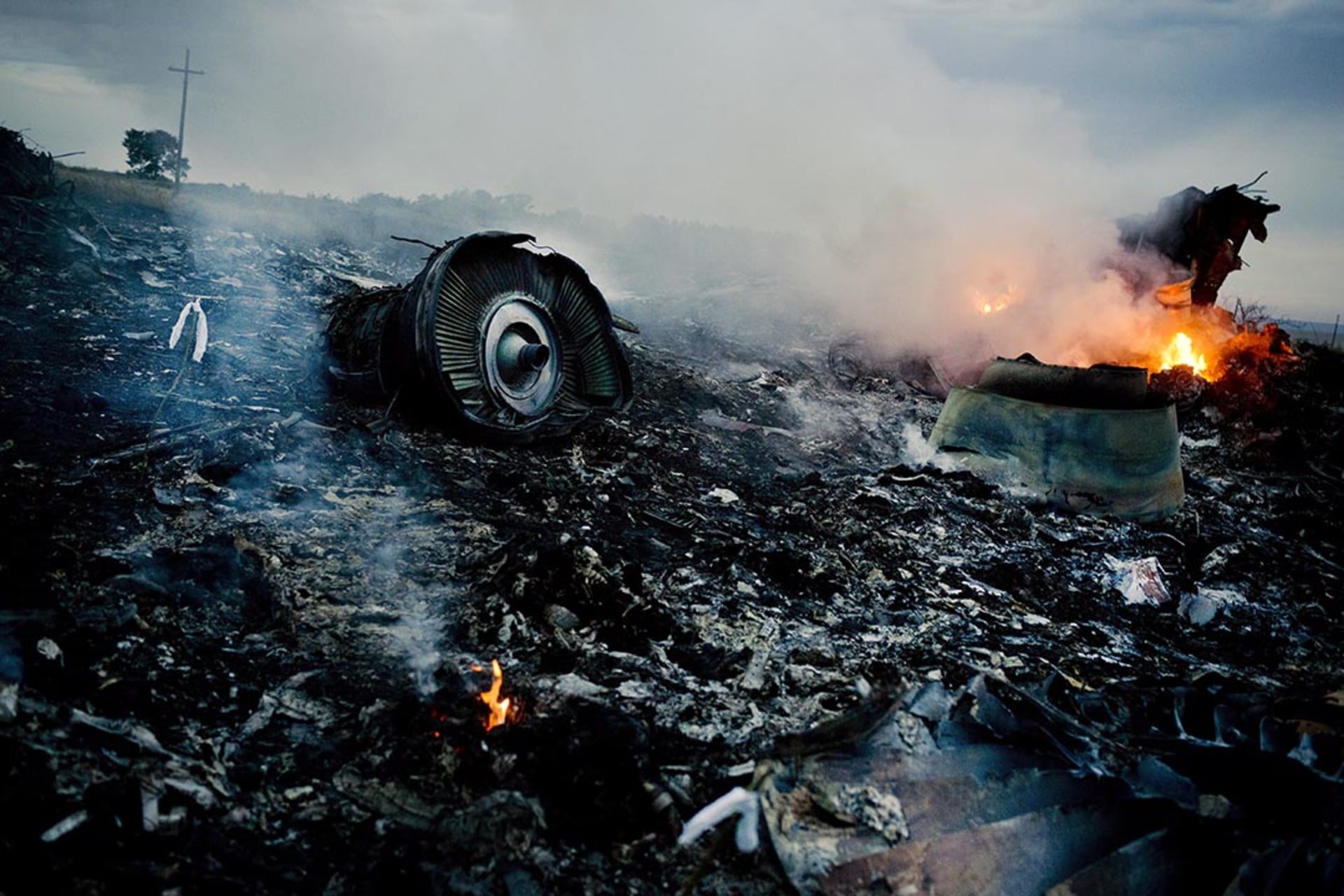 Debris from Malaysia Airlines Flight 17 burns in a field in eastern Ukraine. 
