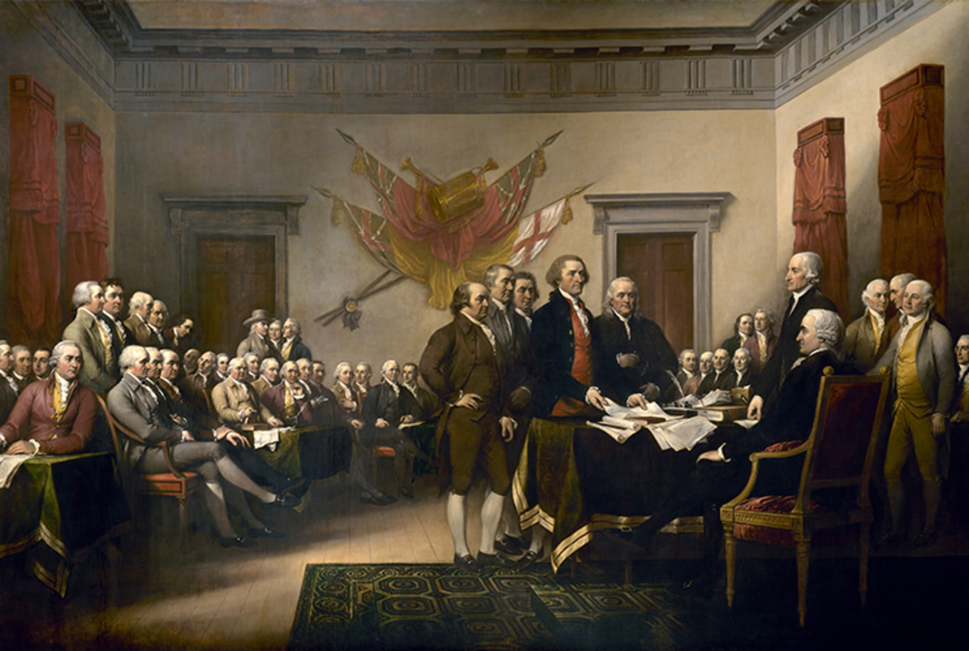 A color painting of the signing of the Declaration of Independence in Philadelphia where all the founding fathers are present.