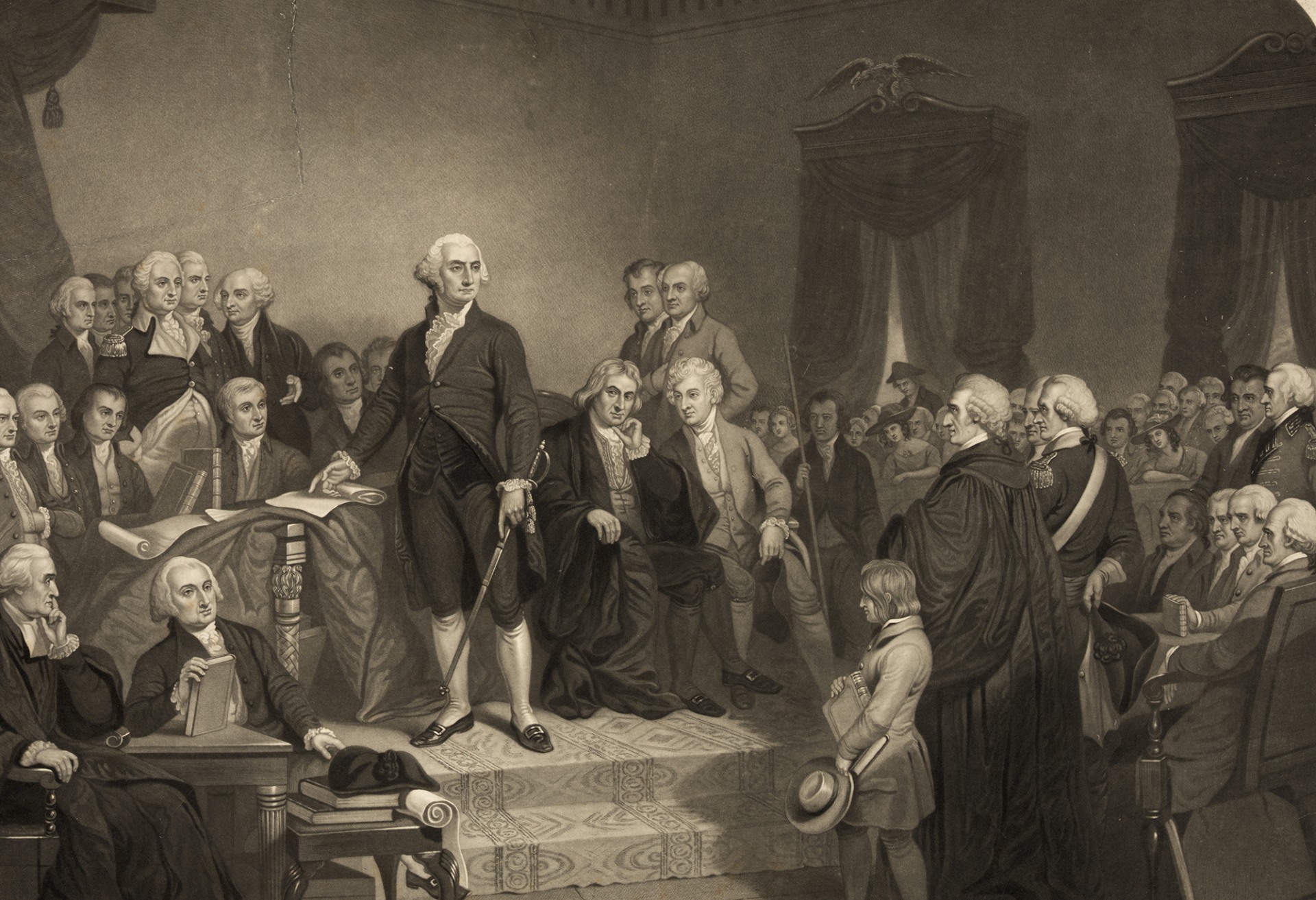 Black and white illustration of George Washington delivering speech in font of crowd of prominent men in old hall