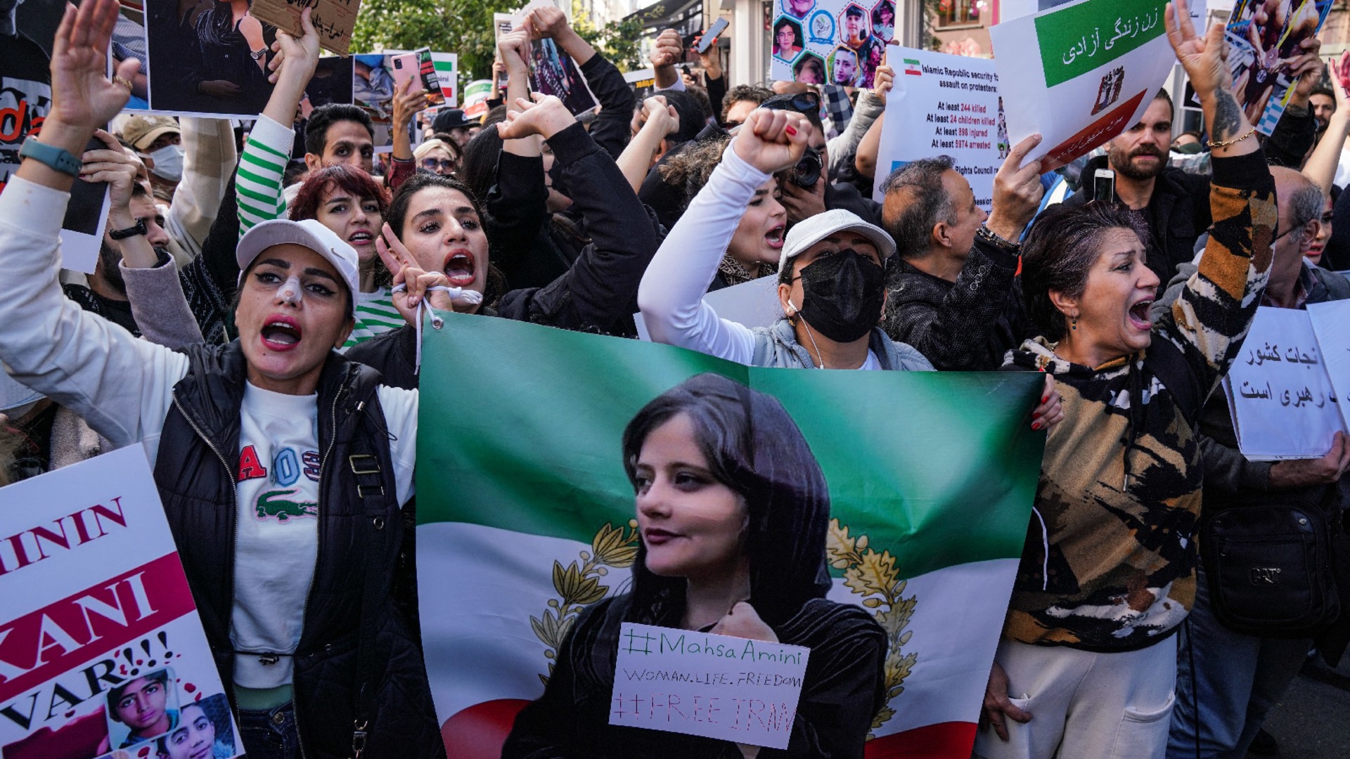 Demonstrators protest the death of Mahsa Amini outside the Iranian Consulate in Istanbul, Turkey, on October 17, 2022.