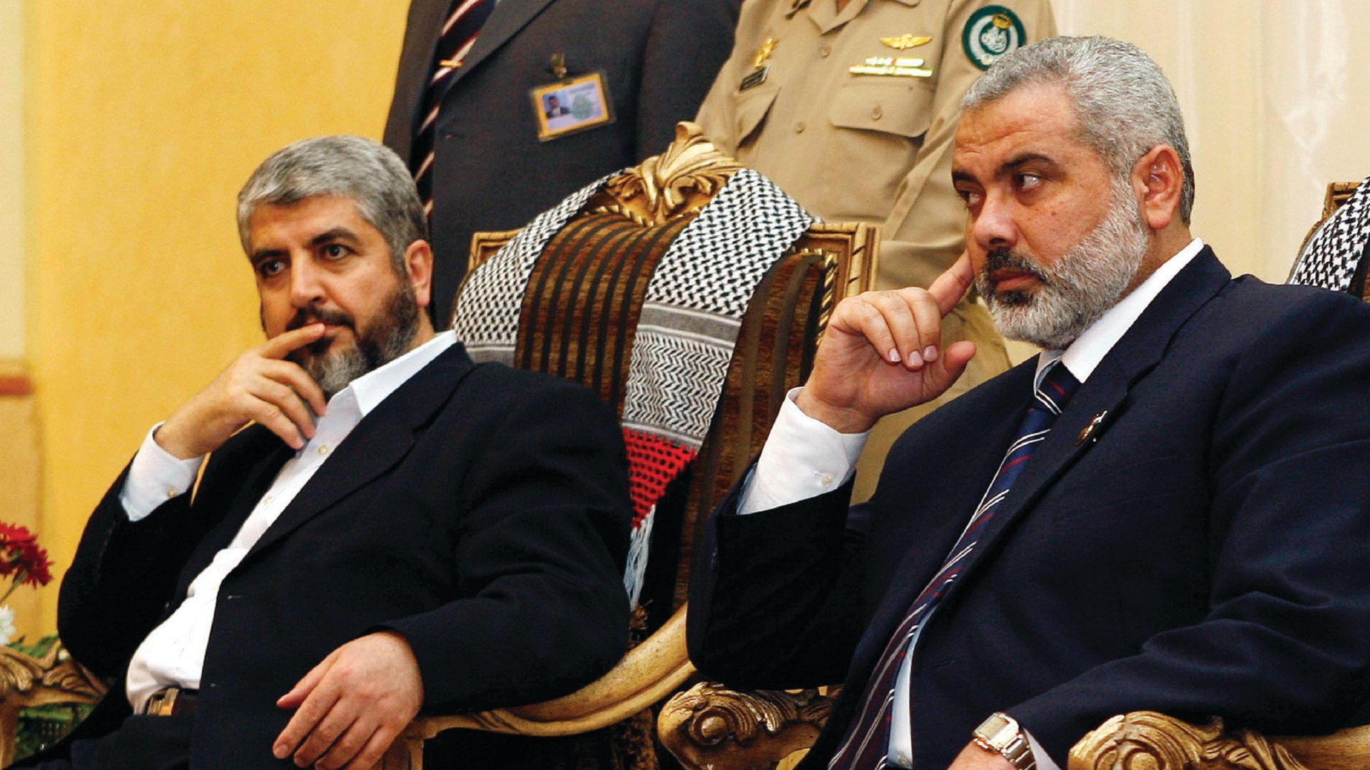Palestinian Prime Minister Ismail Haniyeh sits to the right of Hamas leader Khaled Meshaal during a meeting in Jeddah, Saudi Arabia on February 10, 2007.