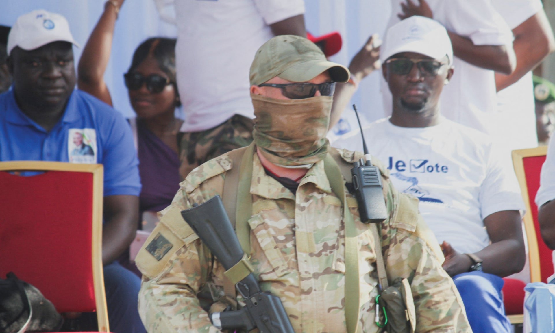 A Russian officer, with his face covered, from the Wagner group stands guard as he takes part in the Central African president Faustin-Archange Touadera's security system.
