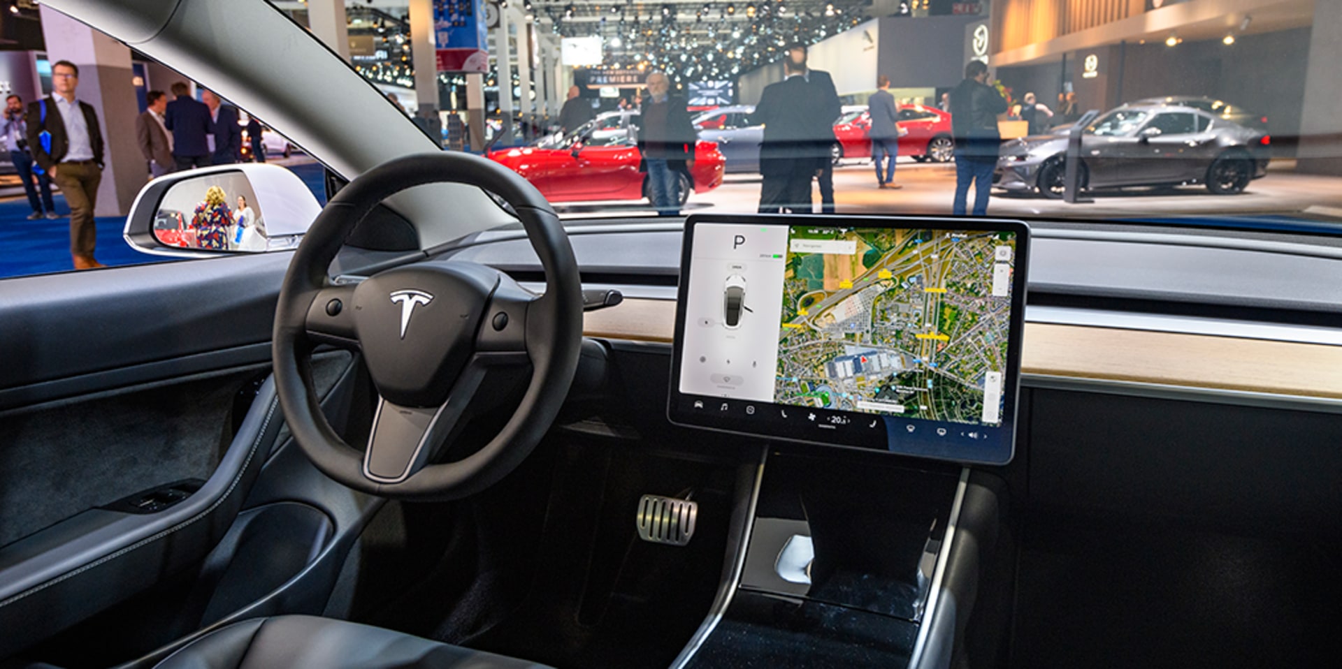 Tesla Model 3 compact full electric car interior with a large touch screen on the dashboard on display at Brussels Expo on January 9, 2020 in Brussels, Belgium.