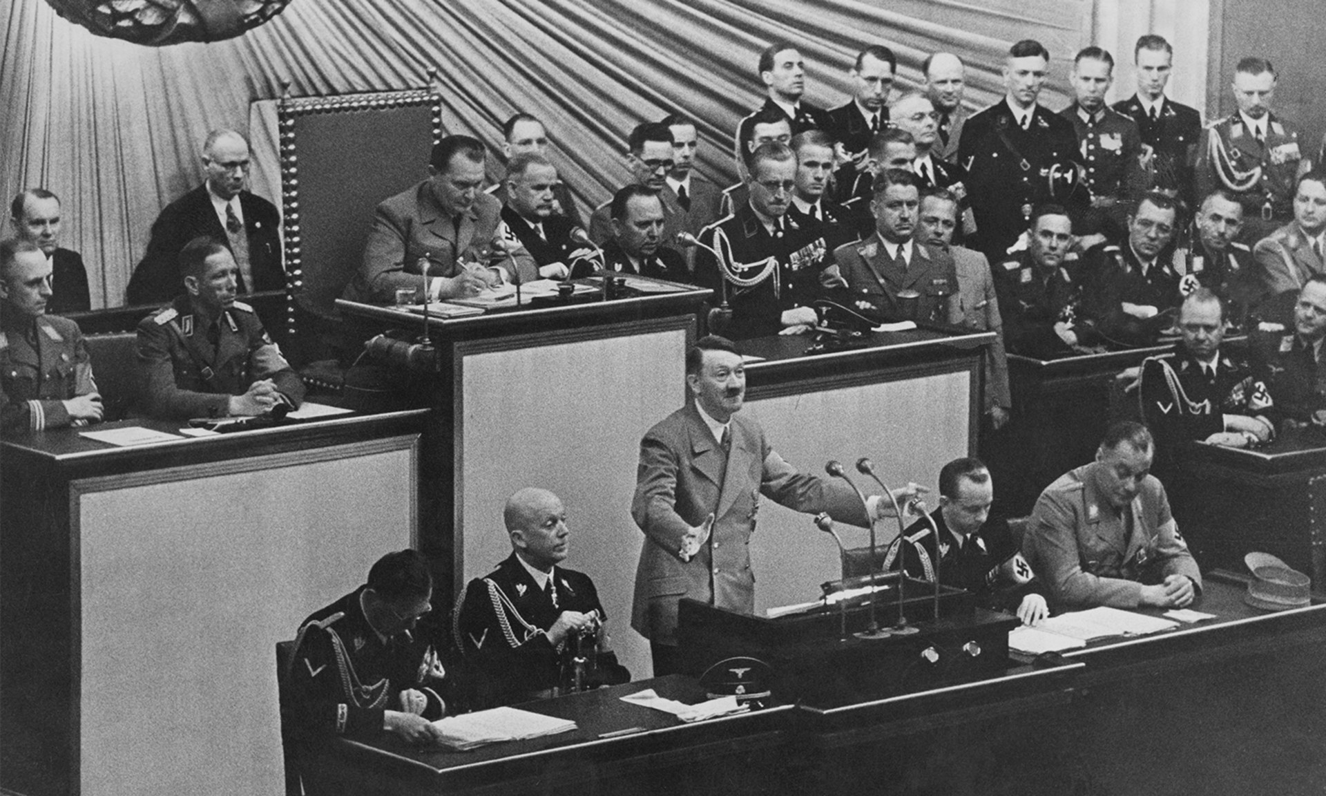 German Chancellor Adolf Hitler addresses the Reichstag during a speech.