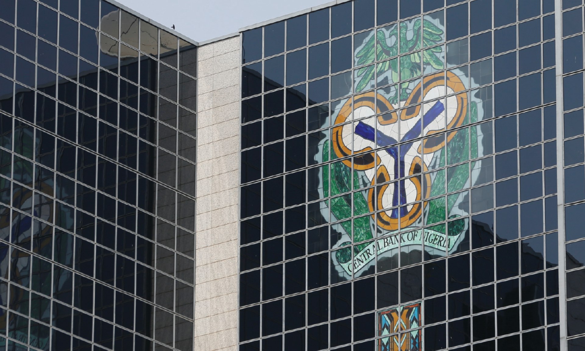 Central Bank of Nigeria's logo is seen on the headquarters building in Abuja, Nigeria January 22, 2018. 