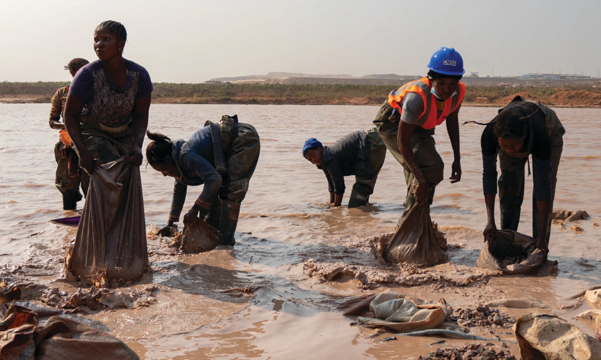 Women wash ore in a artisanal copper-cobalt mine near the city of Kolwezi in Democratic Republic of Congo, on June 20, 2023.