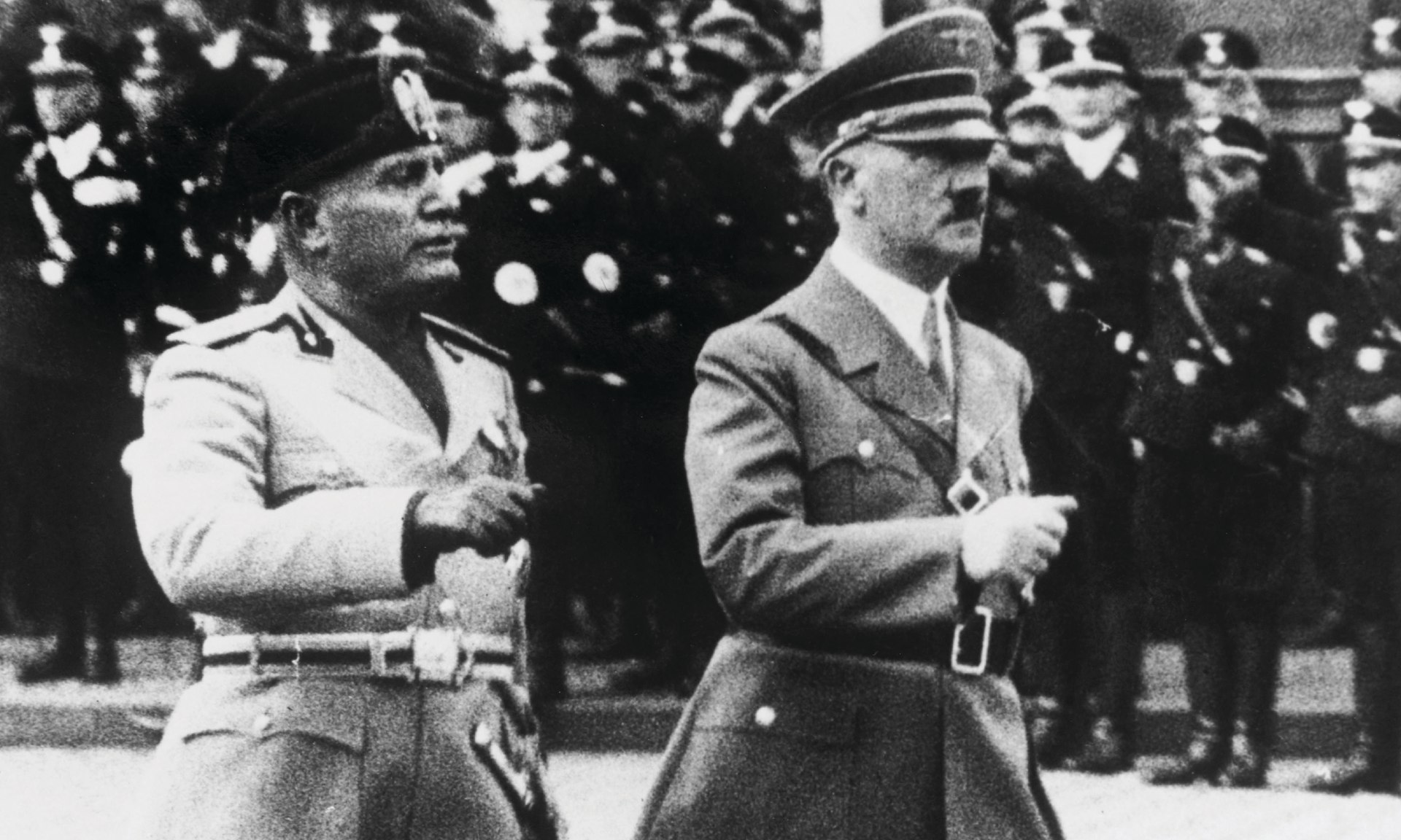 Benito Mussolini (L) and Adolf Hitler (R) at Munich Station in Germany in September 1937.