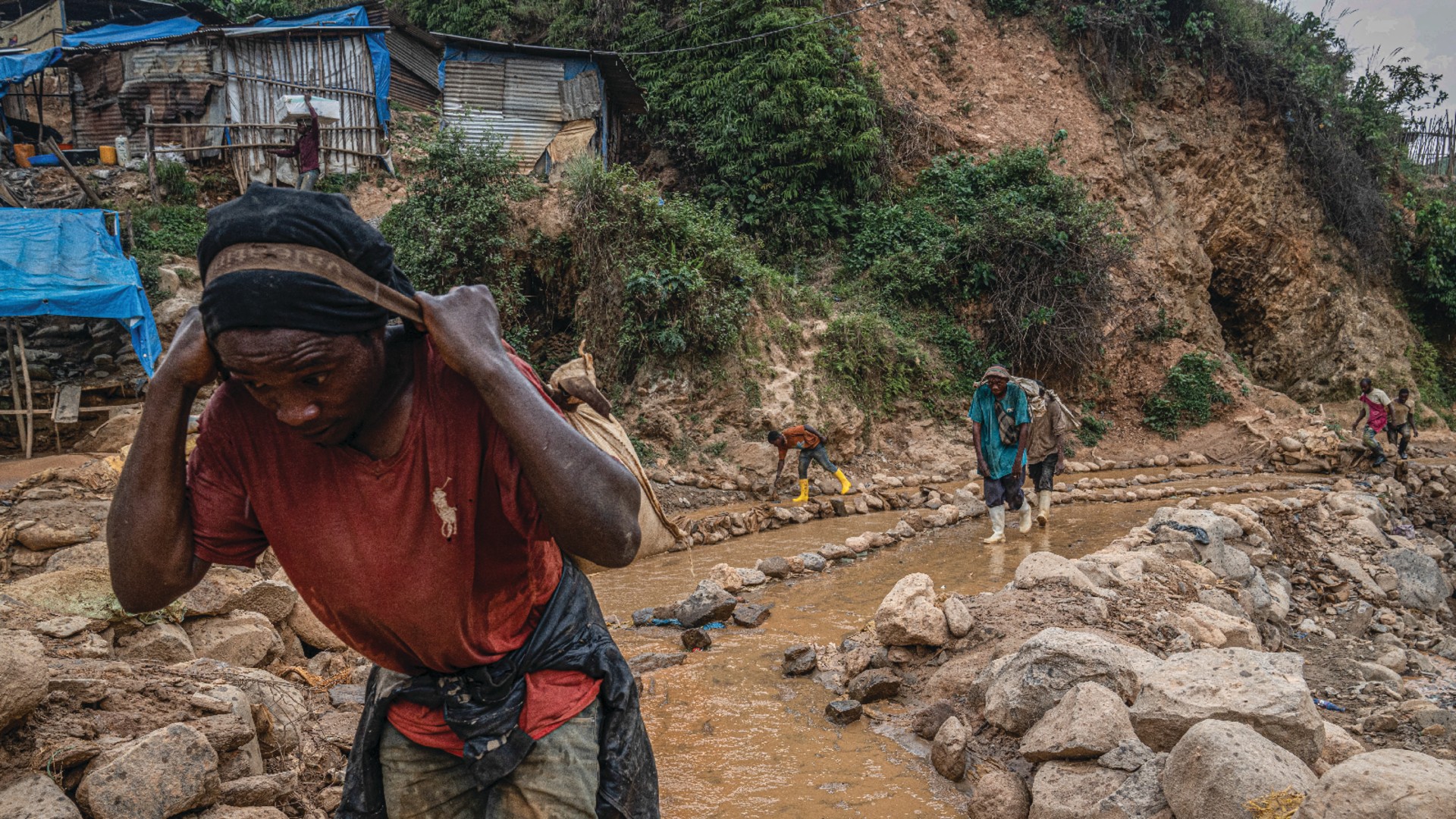 Small-scale artisanal gold miners work without machinery in the South Kivu province, Democratic Republic of Congo, on September 20, 2024.