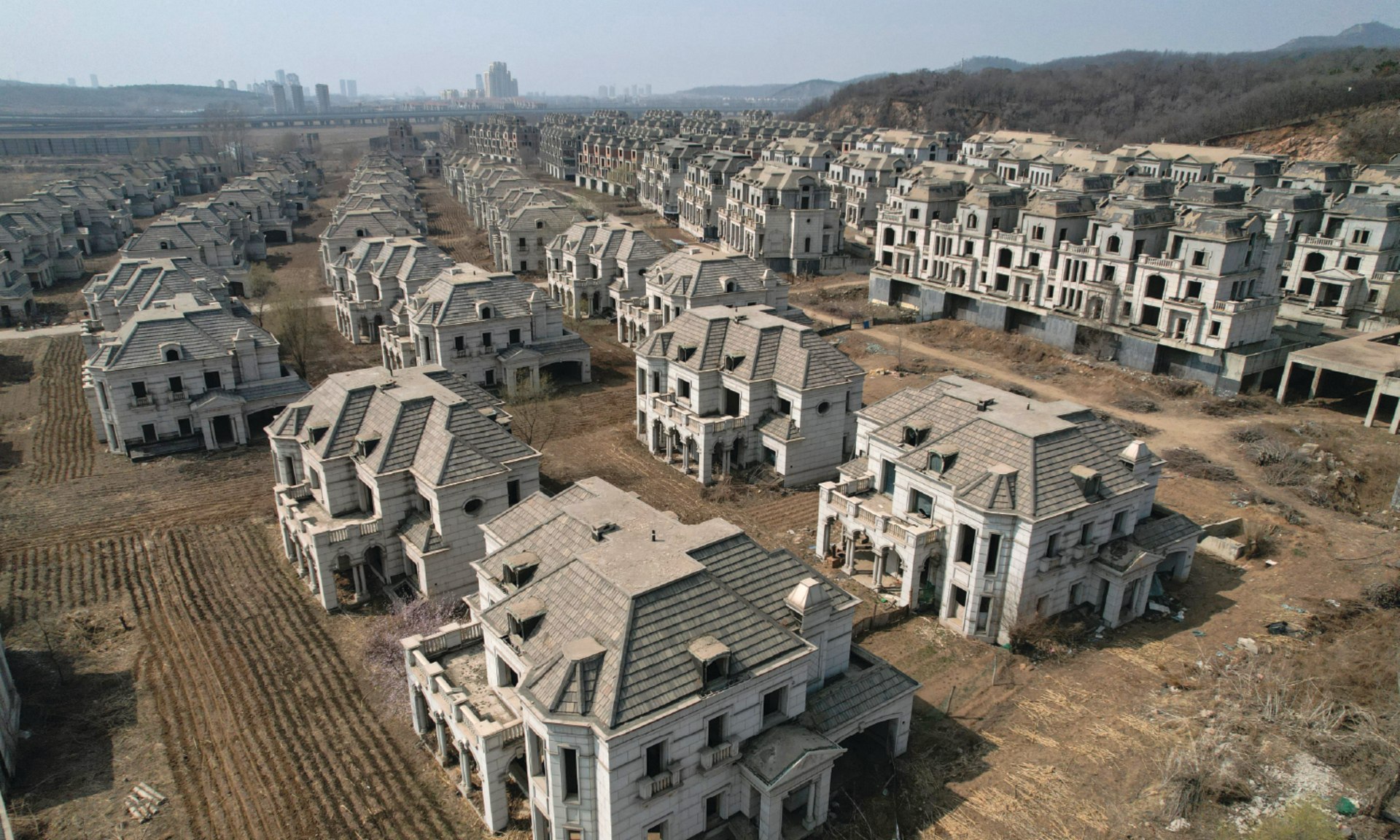 Deserted villas reflect the rapid, unchecked growth of the real estate industry in many areas, in a suburb of Shenyang, China, on March 31, 2023.