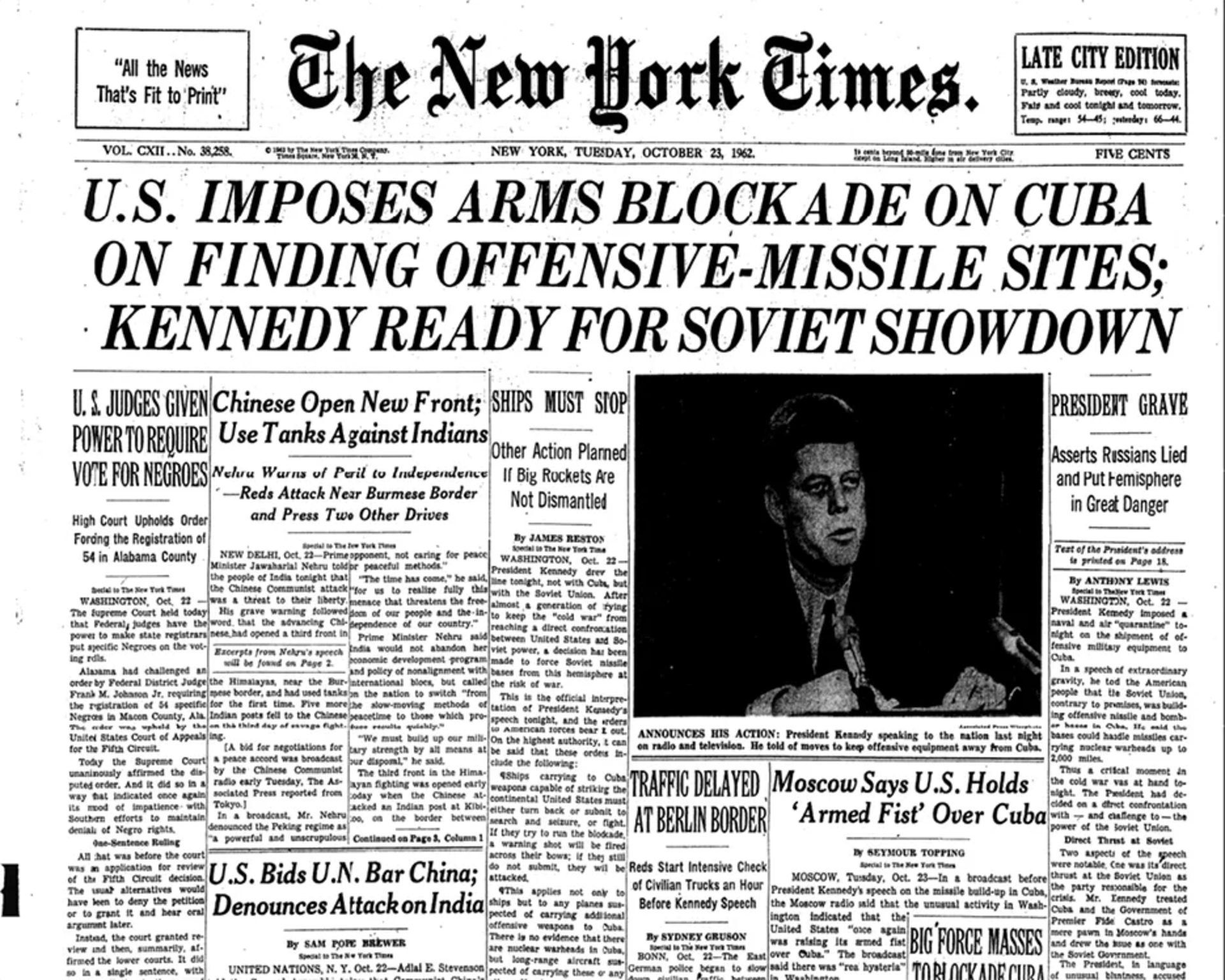 The front page of the New York Times with a headline on the arms blockade the U.S. imposed on Cuba and a photo of JFK.