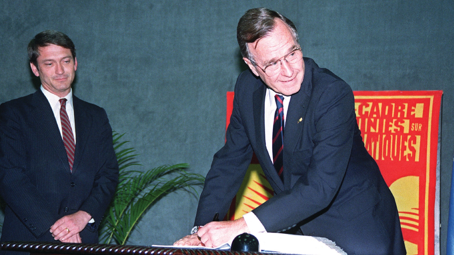 President George H.W. Bush signs the United Nations Climate Change Convention at the UN-sponsored Earth Summit in Rio de Janeiro, Brazil 