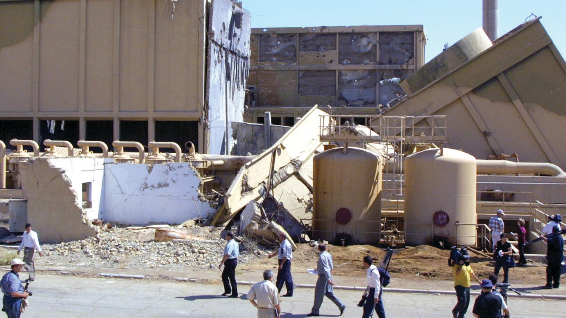 Journalists are shown the destroyed Tammuz Iraqi nuclear reactor.