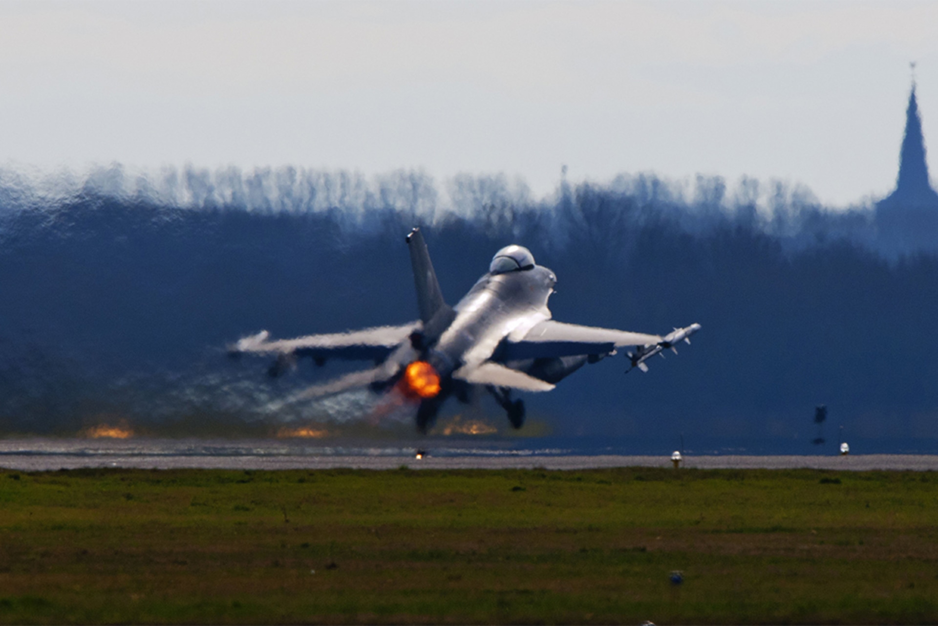 An F-16 takes off from Leeuwarden Airbase for the Italian island of Sardinia on March 24, 2011.