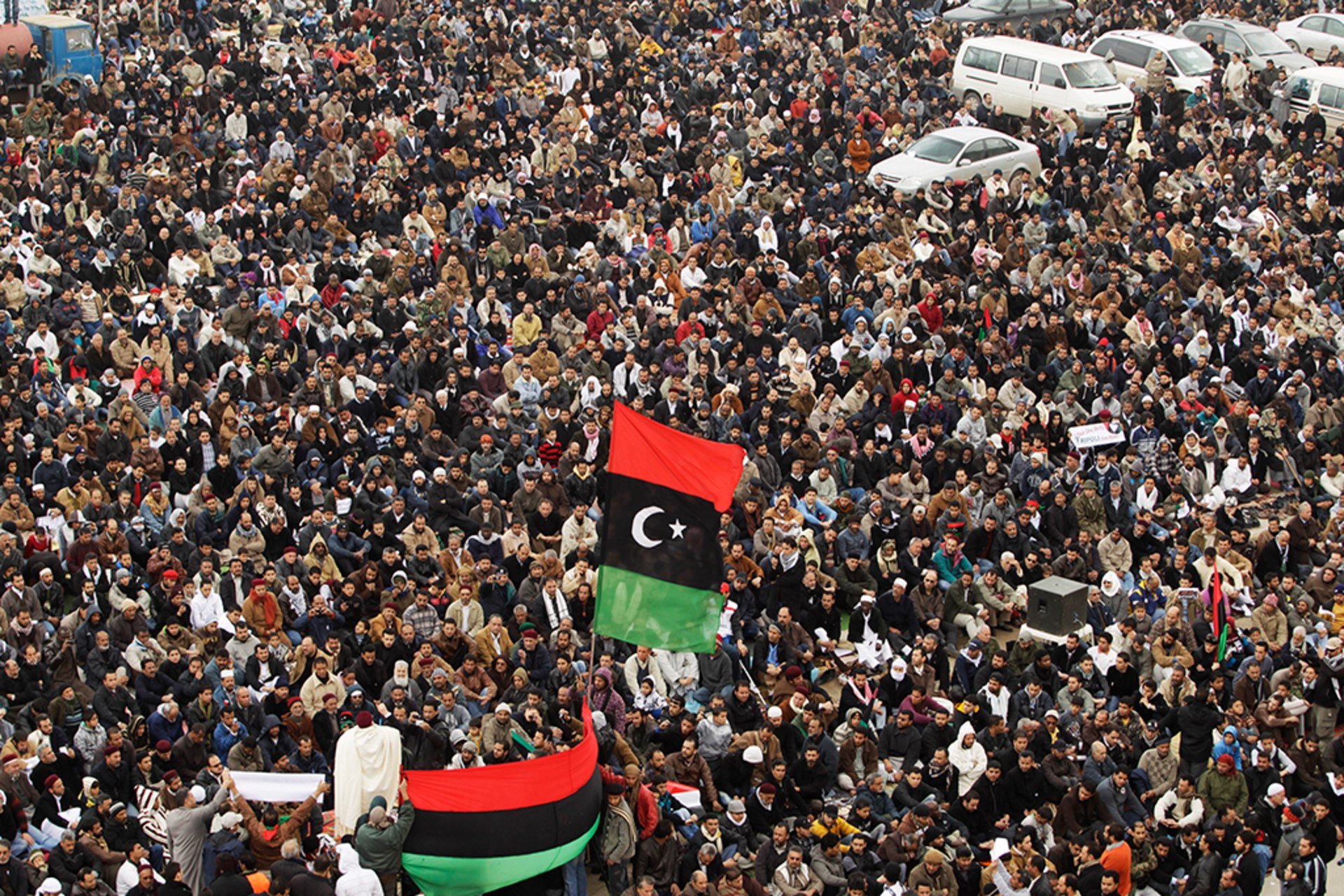 Anti-Gaddafi protesters attend Friday prayers in Benghazi on February 25, 2011.