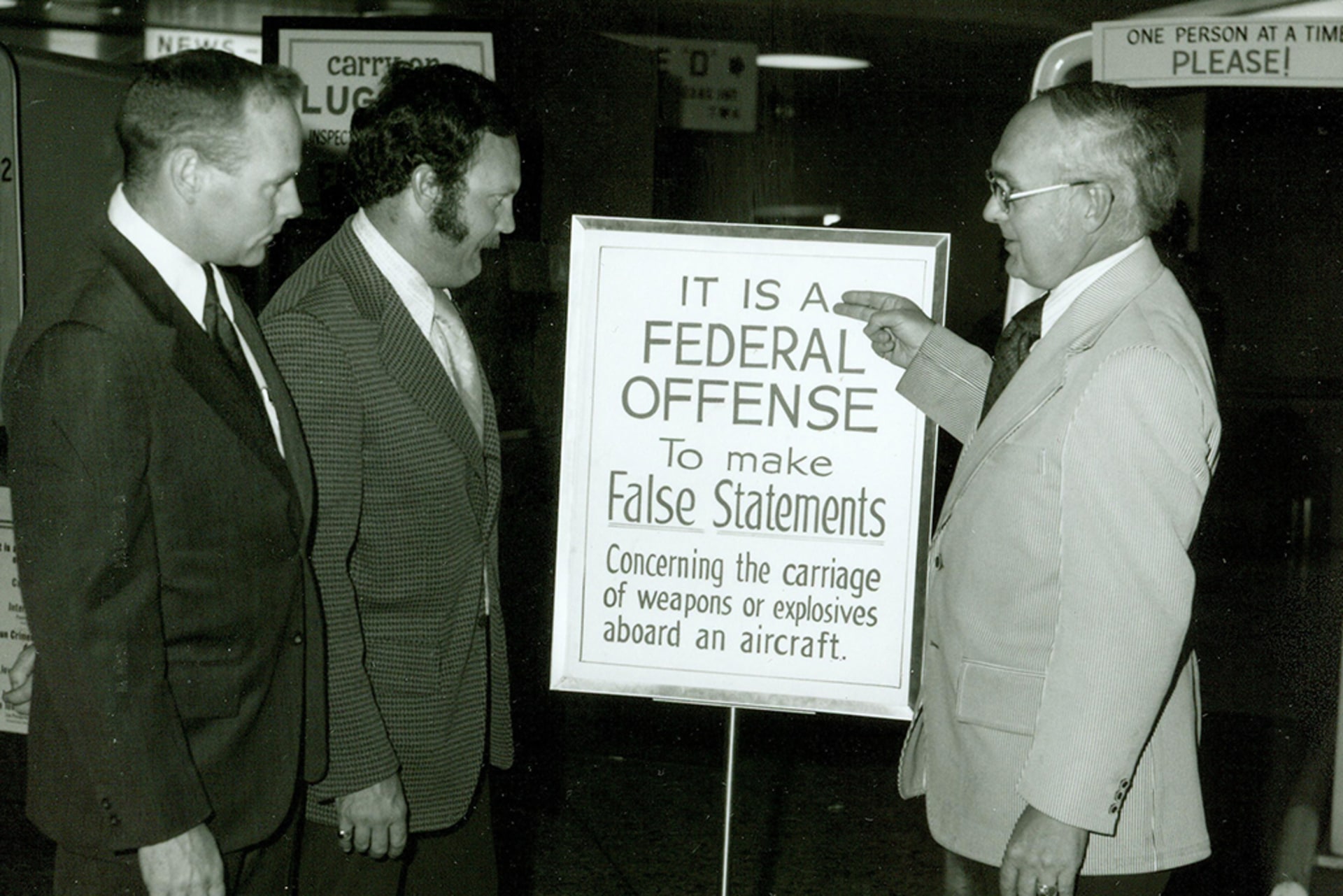 A Federal Aviation Administration sign details aviation security measures that were instituted in the 1970s.