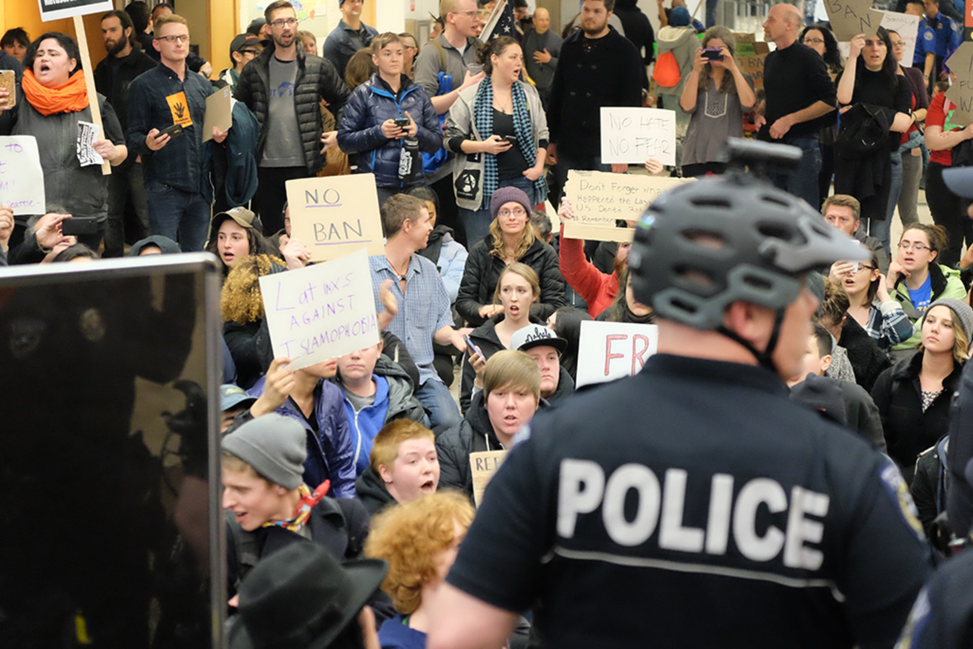 Demonstrators protest against the Trump administration’s immigration ban at Seattle-Tacoma International Airport, on January 28, 2017.