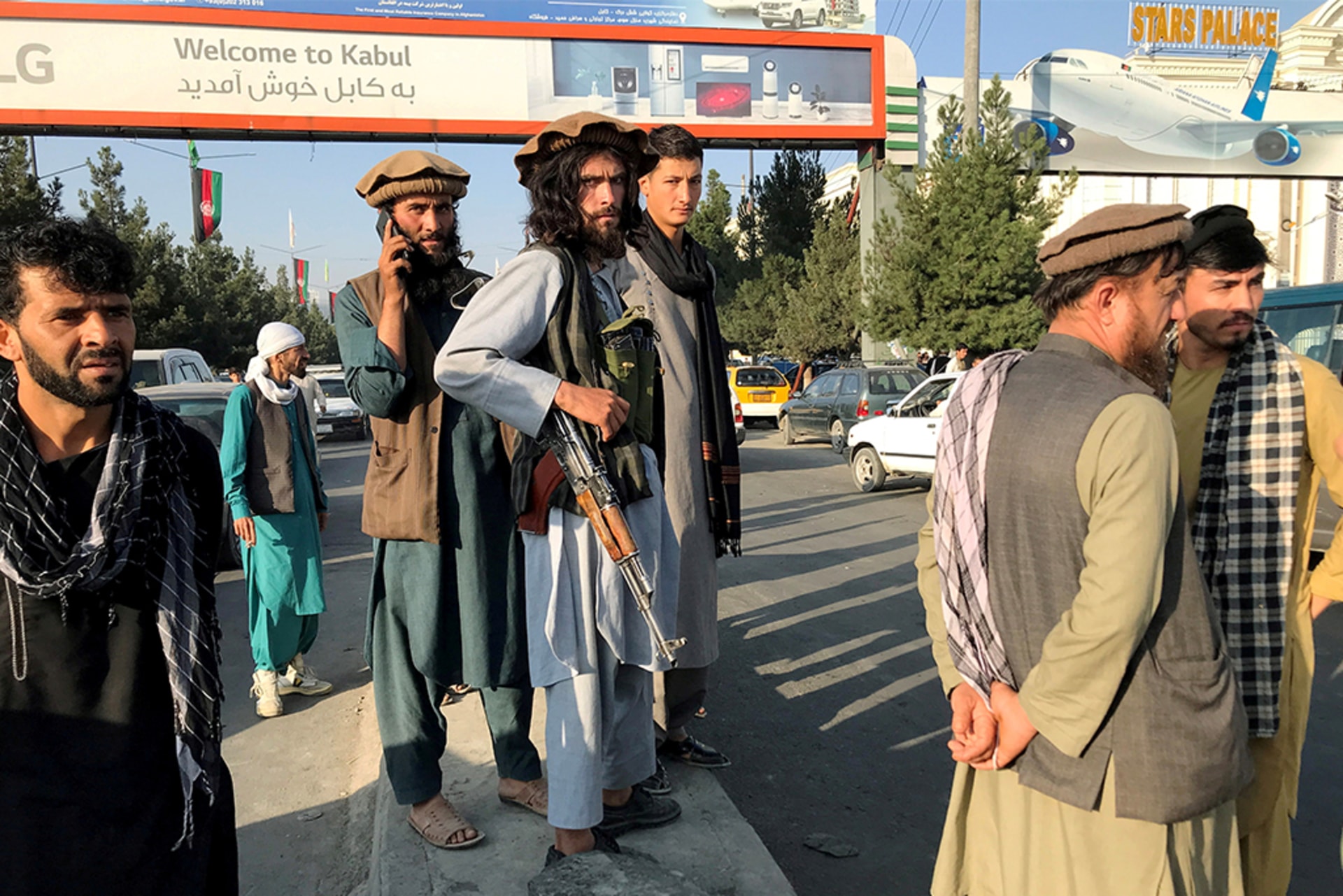 A member of Taliban stands outside Hamid Karzai International Airport in Kabul, Afghanistan on August 16, 2021.