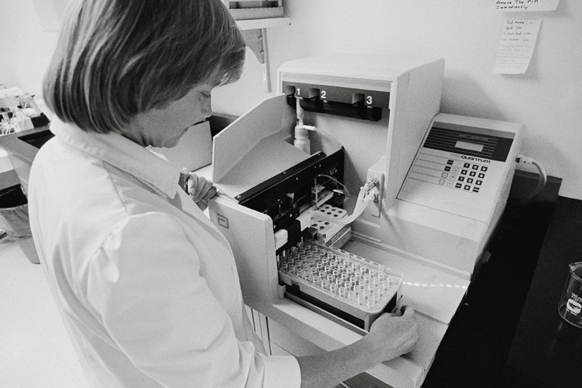 Jeanie Newcomb tests donated blood for AIDS antibodies at the Belle Bonfis Blood Bank in Denver, Colorado, on July 30, 1986.