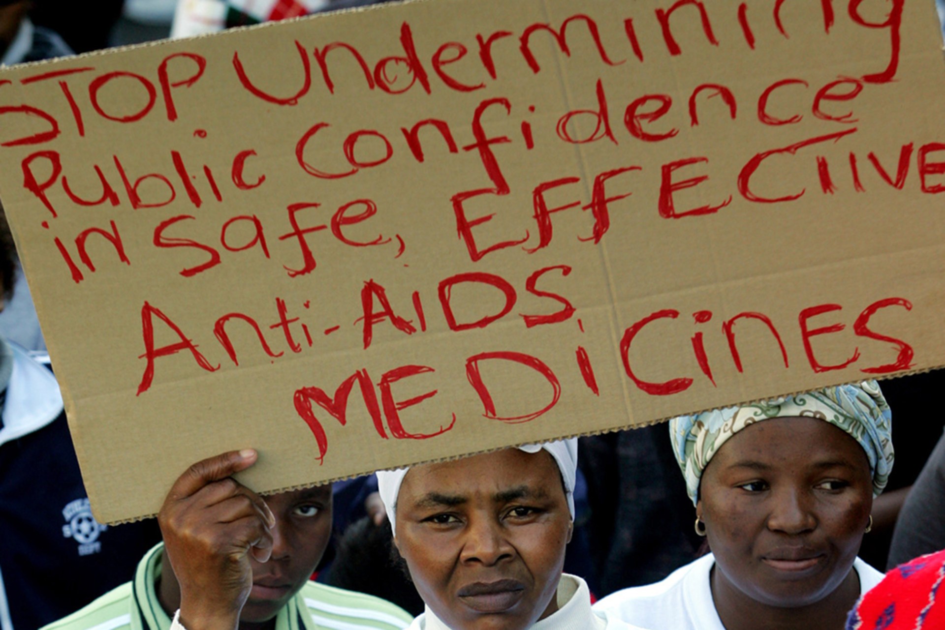 AIDS activists protest outside the U.S. consulate in Cape Town, South Africa, on June 24, 2004.