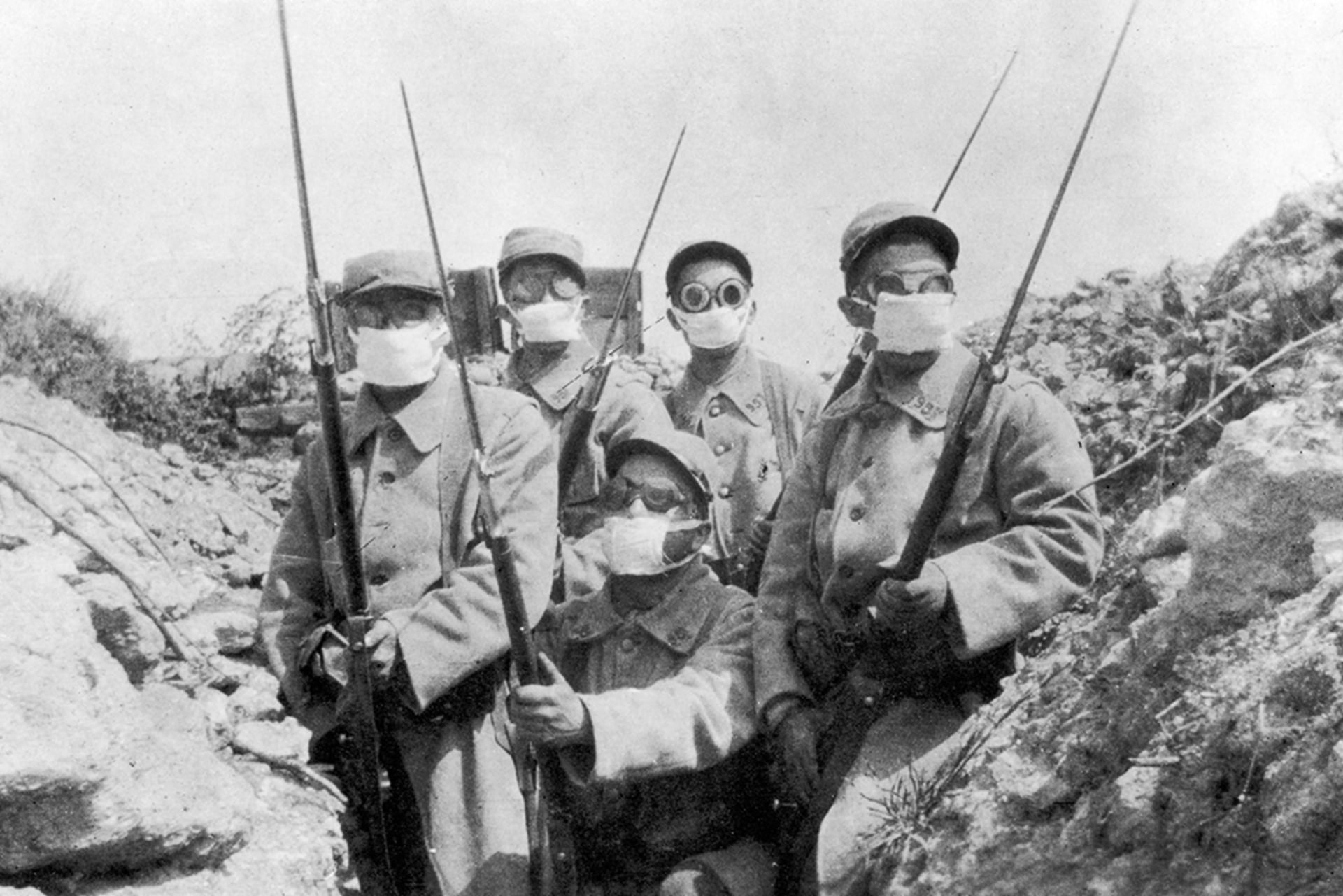 French troops wearing an early form of gas mask in the trenches during the Second Battle of Ypres in 1915.