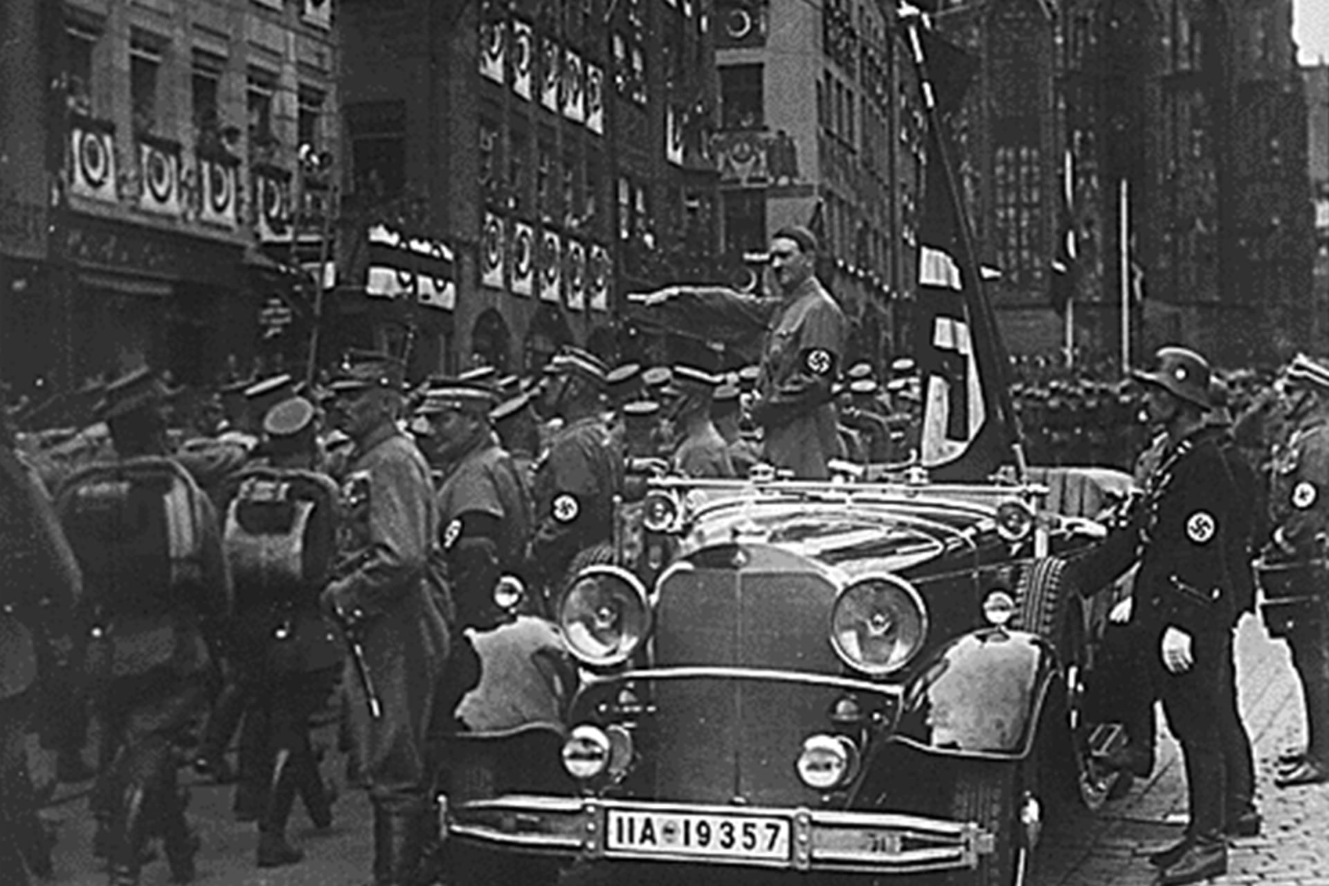 A parade of Nazi troops marches past Adolf Hitler in Nuremberg, Germany, in 1935.