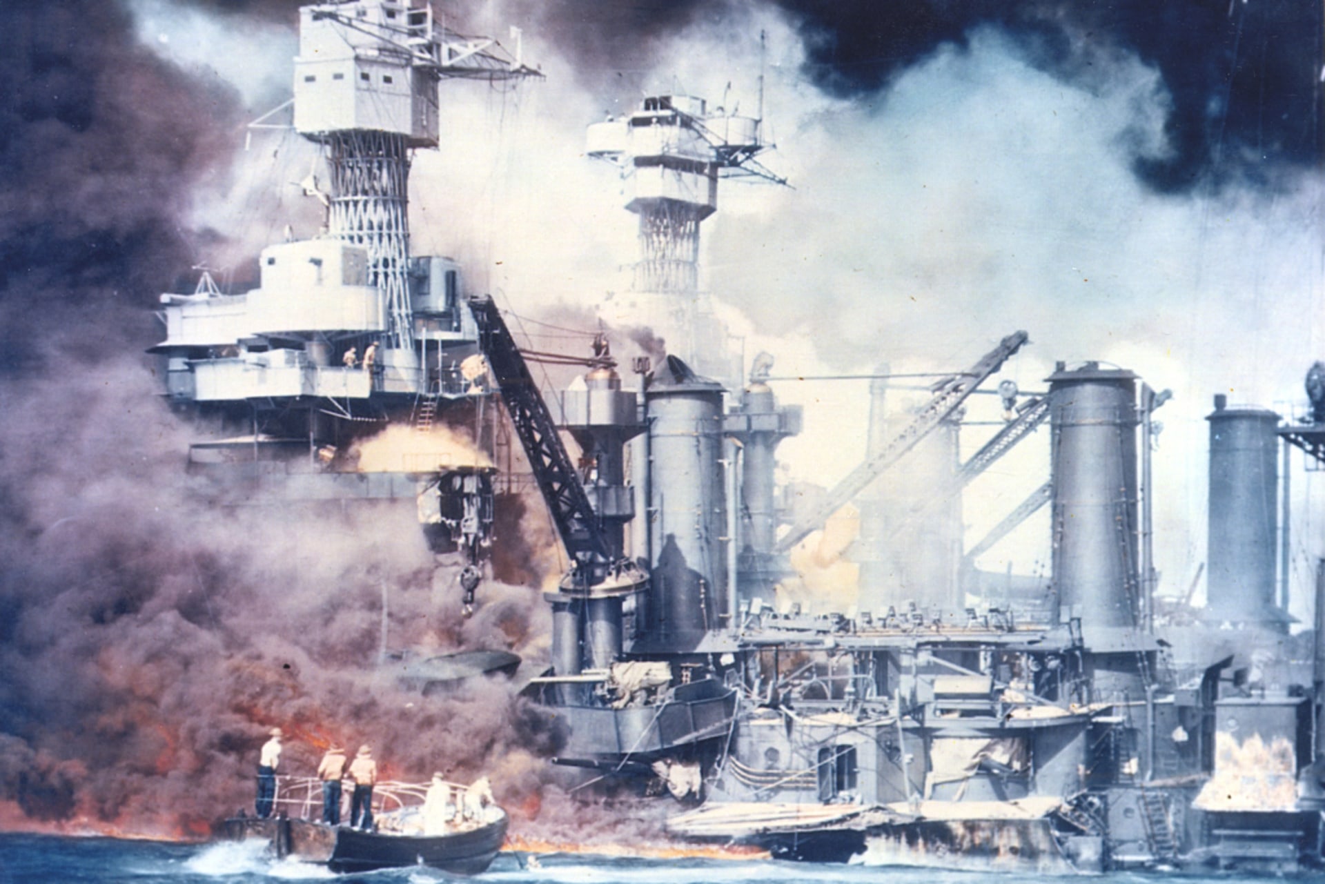 Fire and smoke raging following the attack on Pearl Harbor.