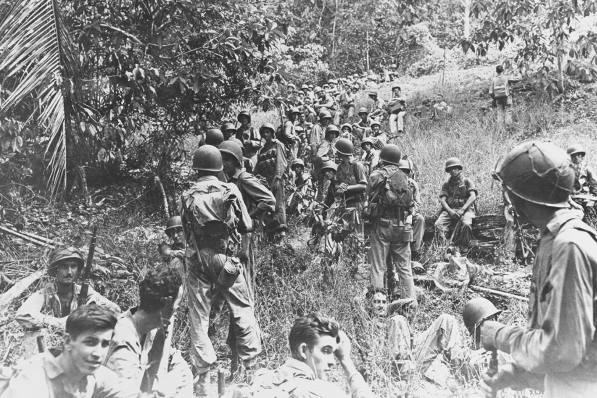 Marines rest in the field on Guadalcanal some time between August and December 1942.