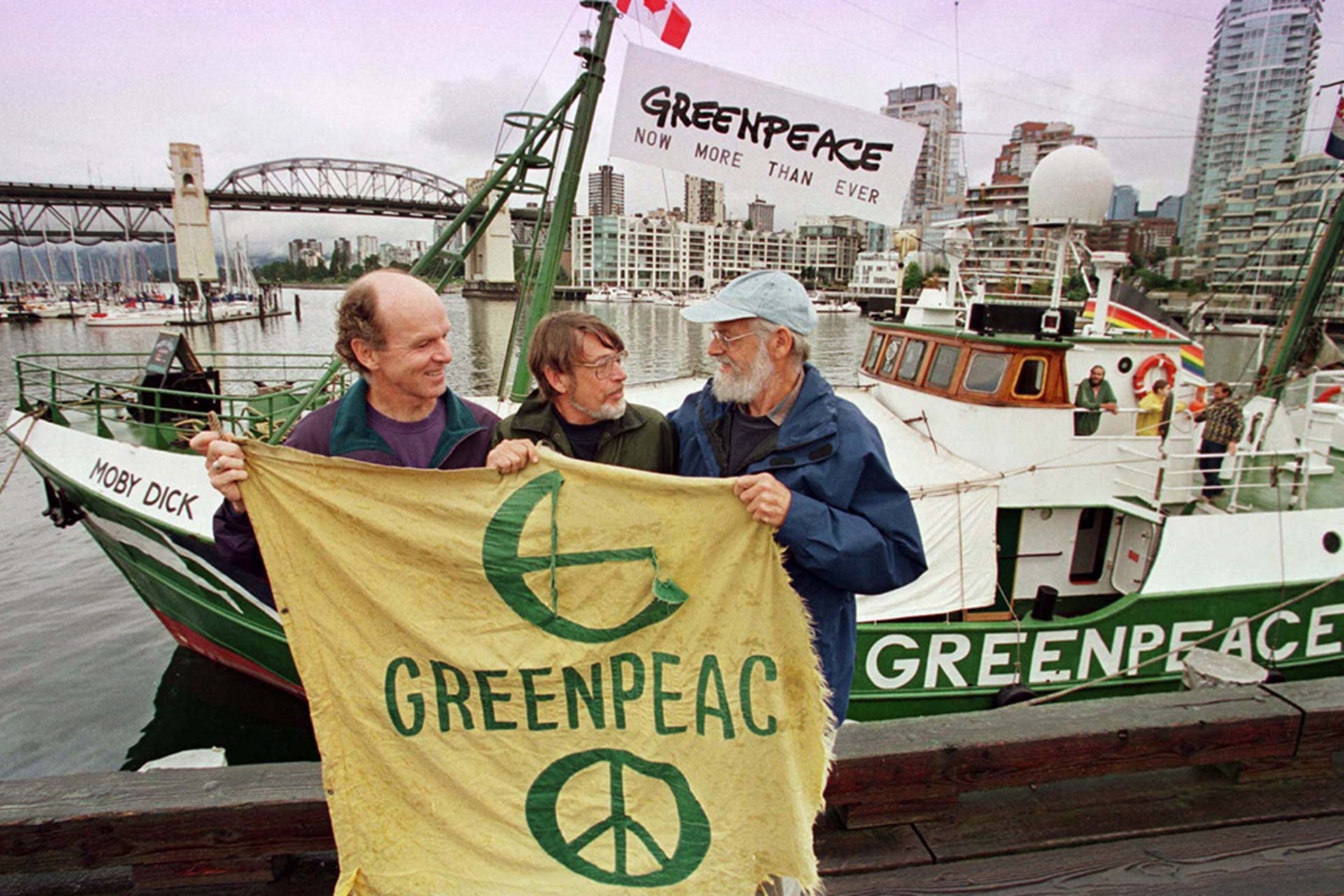 Founding members of Greenpeace Bill Darnell, Lyle Thurston, and Jim Bohlen hold the original banner in Vancouver, Canada on September 15, 1971.