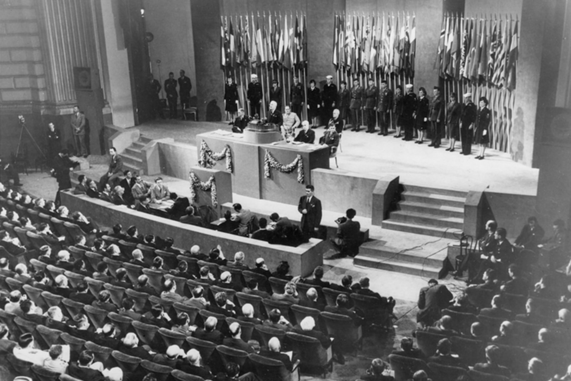 U.S. President Harry S. Truman (behind the podium) addresses the closing session of the UN conference in San Francisco, California.