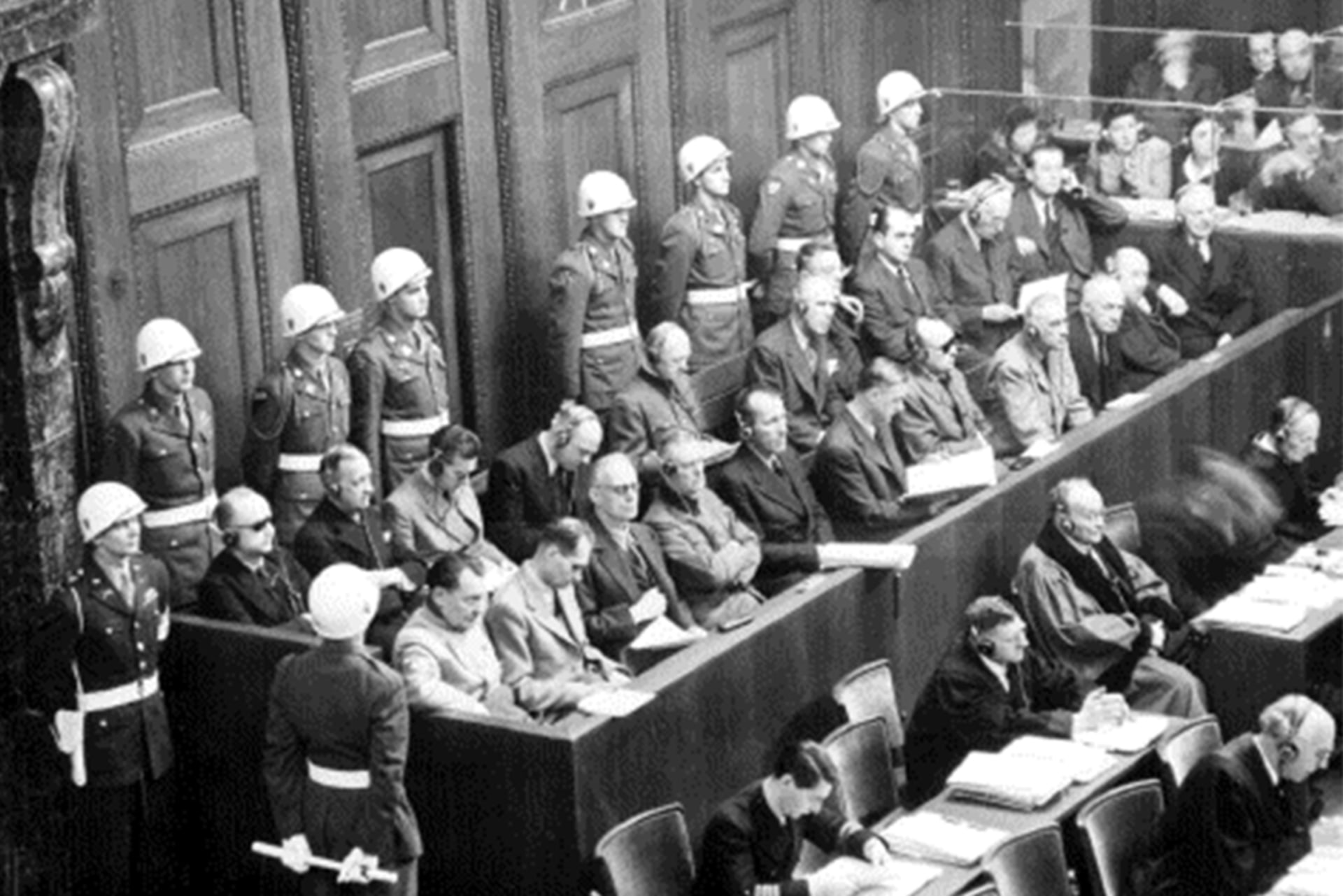 Defendants seated in a row at the Nuremberg Trials.