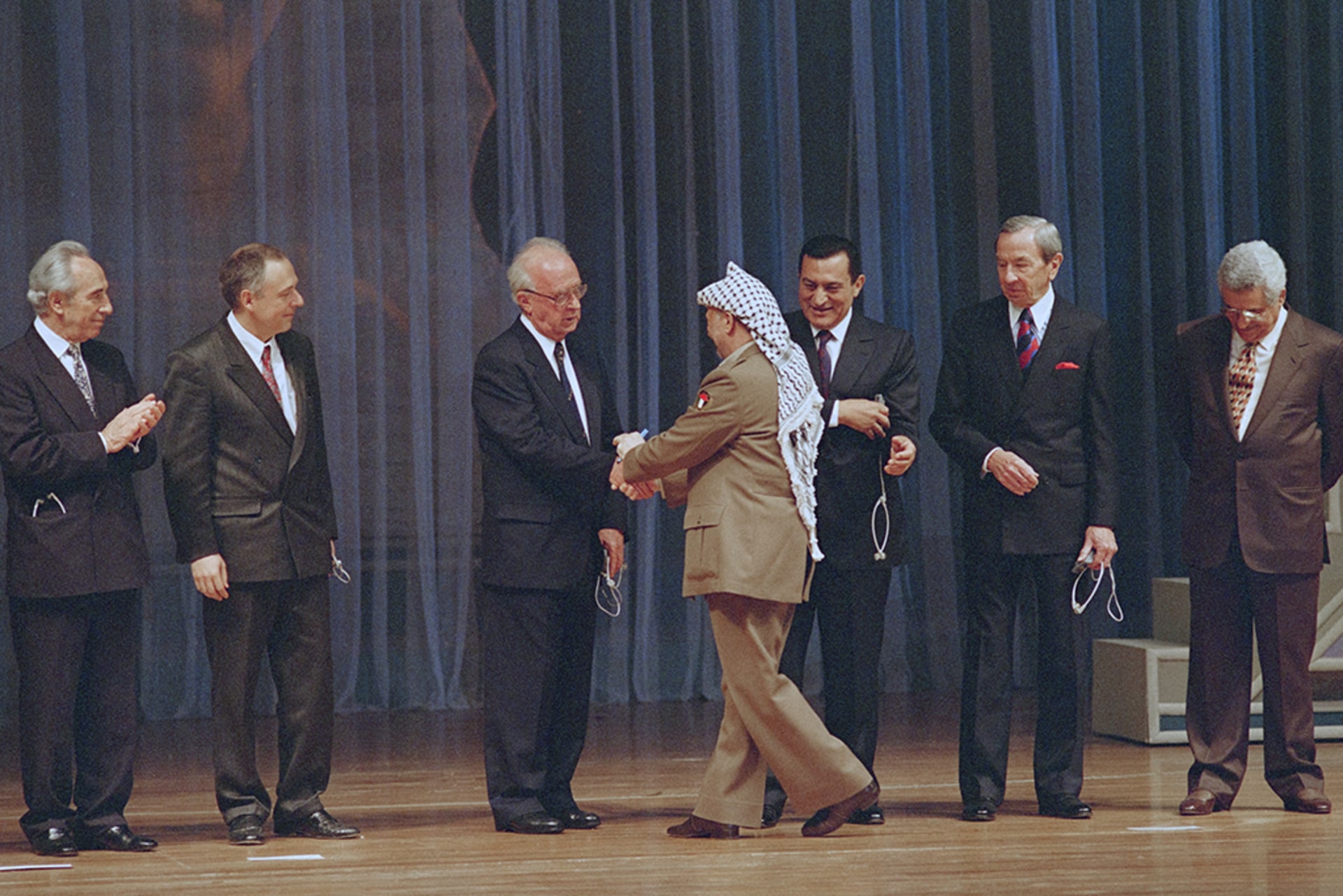 Yasser Arafat, President of Palestine Liberation Organisation, shakes hands with Israeli Premier Yitzhak Rabin in Cairo at the Gaza-Jericho Autonomy Agreement.