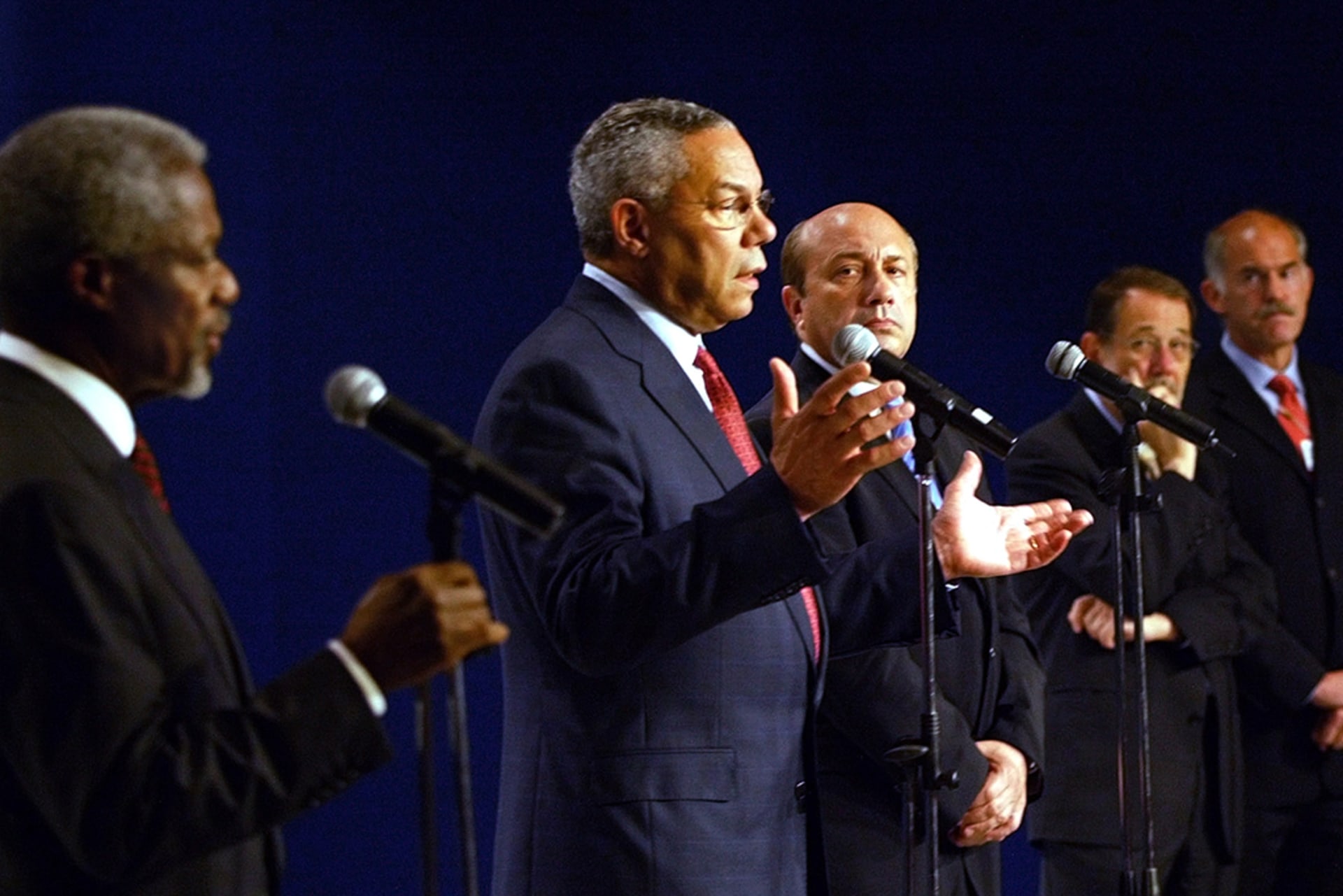 U.S. Secretary of State Colin Powell speaks as he stands with U.N. Secretary-General Kofi Annan, Russian Foreign Minister Igor Ivanov, EU foreign policy chief Javier Solana, and Greek Foreign Minister George Papandreou at a joint news conference.