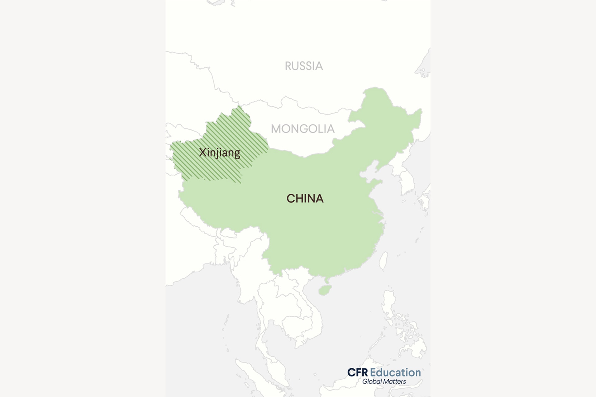 A map graphic showing China highlighted in green and Xinjiang highlighted green with stripes.