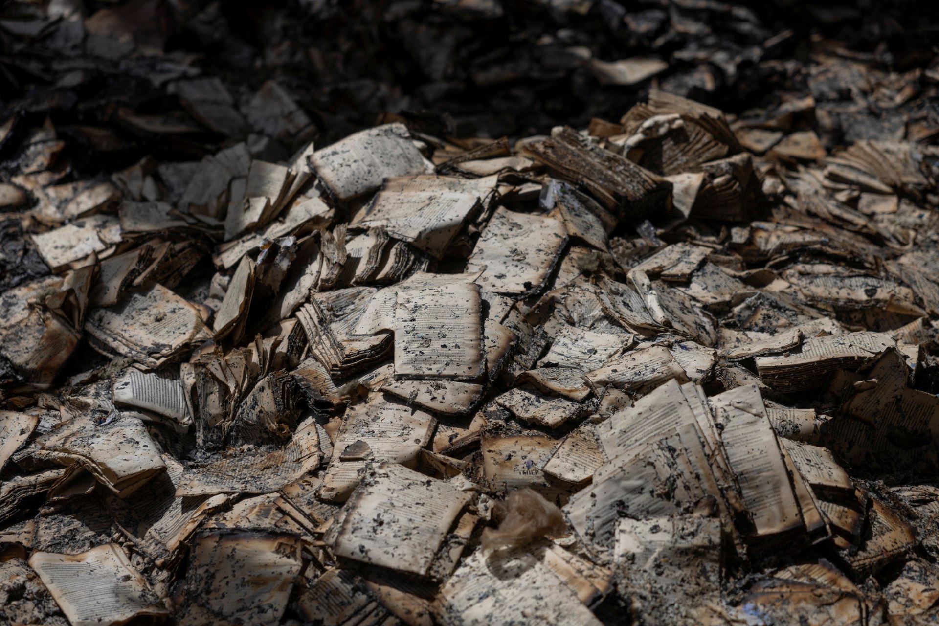 <p>Burnt books are seen inside the printing house of Ukrainian publisher and businessman Sergii Polituchyi, which was badly damaged by a recent Russian missile strike, amid Russia’s attack on Ukraine, in Kharkiv, Ukraine May 26, 2024.</p>