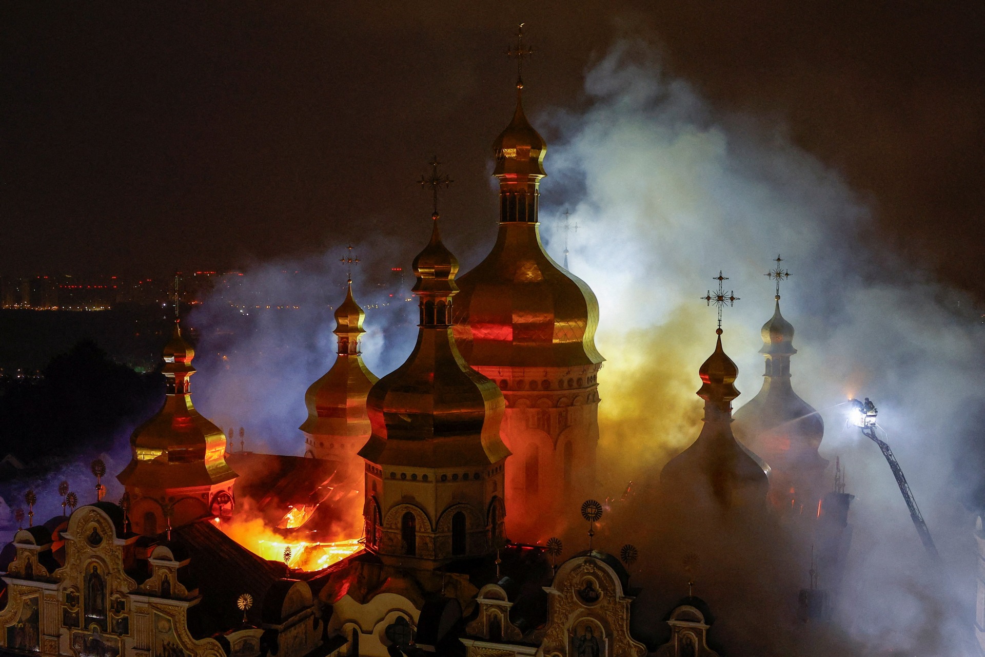 <p>Firefighters work to extinguish a fire at the Dormition Cathedral of the Kyiv Pechersk Lavra, which was hit during Russian missile and drone strikes, amid Russia’s attack on Ukraine, in Kyiv, Ukraine June 15, 2026.</p>