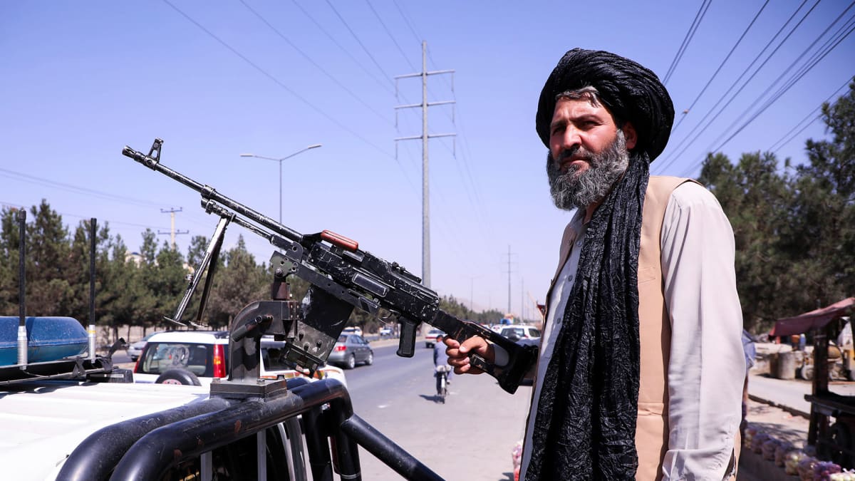 A member of the Taliban force stands guard at a checkpoint in Kabul, Afghanistan, September 2, 2021.